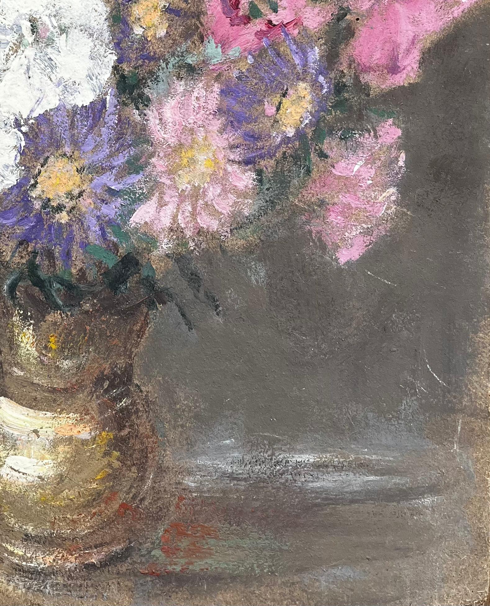 Title: French Still Life with Pink White and Purple Flowers in a Golden Jug
by Fanch Lel
Size: 18.25 x 15 inches (height x width)
Oil painting on board, unframed
Condition: Good condition overall. Some wear to the corners and light surface marks