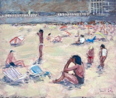 Tomadores de sol relajándose en un día soleado de playa Dinan, La Plage Francia