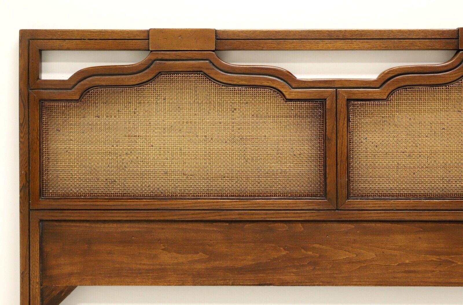 A Neoclassical style king size headboard by Fancher Furniture. Walnut & oak with three decoratively carved panels inset with cane. Made in Salamanca, New York, USA, in the mid 20th century. 

Measures: 79W 1D 39.5H

Exceptionally good vintage