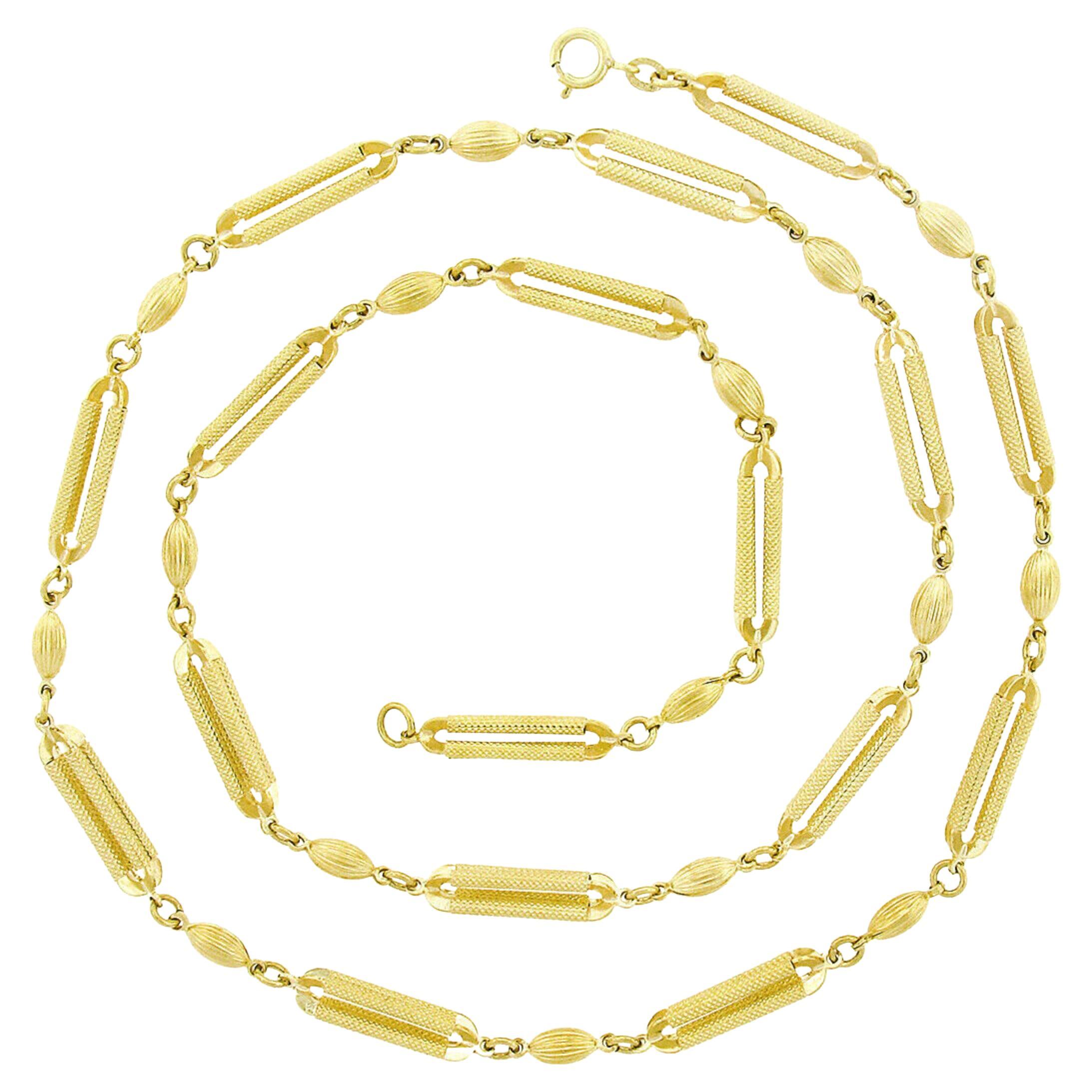 Lange Kette mit durchbrochenen, ovalen, strukturierten, durchbrochenen Gliedern, 14K Gold im Angebot
