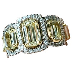 Fancy 18 Karat Gold Ring with Yellow and White Diamonds Emerald Shape