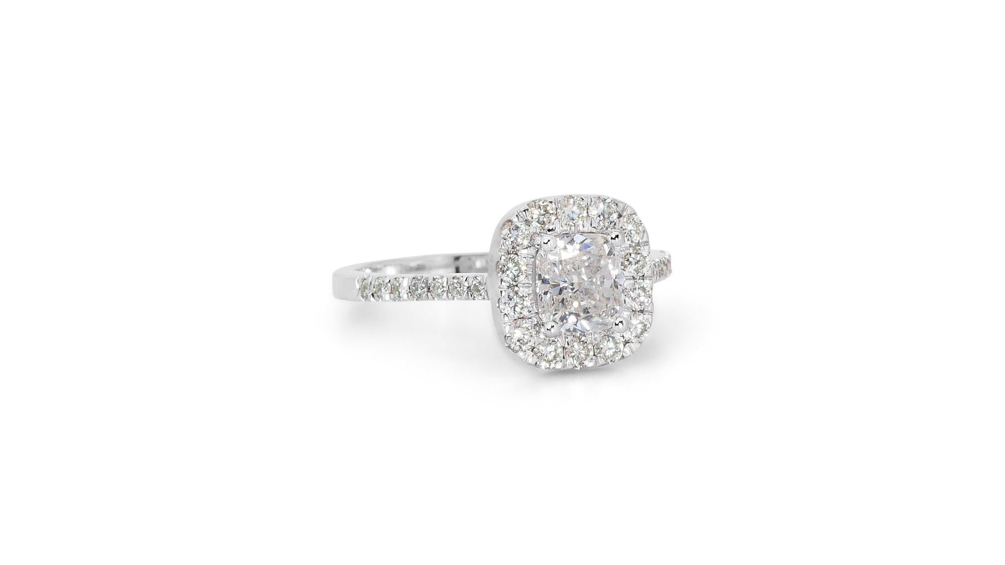 Elevate your style and express your unique sophistication with this 1.46ct Halo Pave Diamond Ring, a timeless symbol of refined taste and enduring beauty. This ideal cut diamond ring comes with a GIA Certification for it's authenticity and excellent