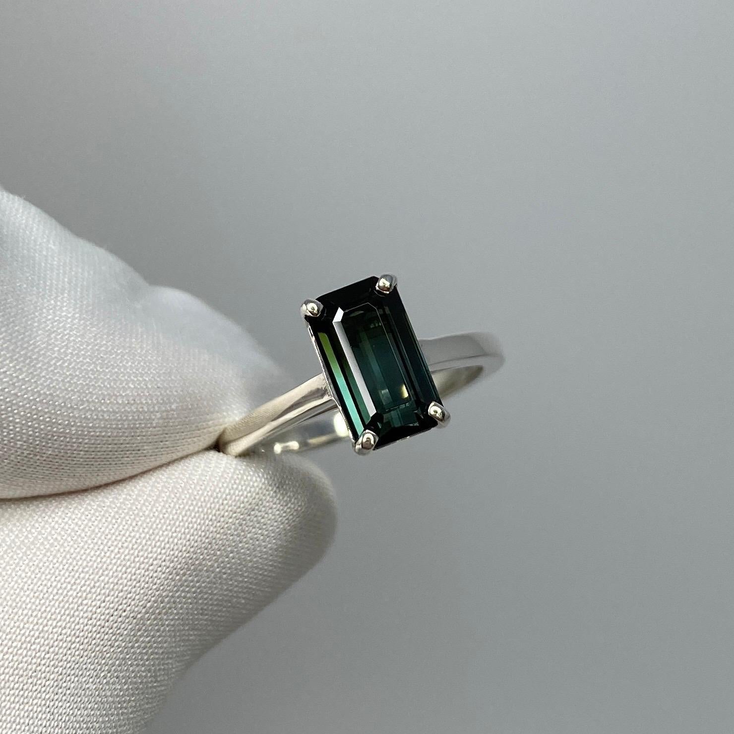 Bi Colour Green Blue Emerald Cut Tourmaline Silver Solitaire Ring.

Stunning 2.12ct stone with a beautiful bi colour effect and very good clarity, clean stone with only some small natural inclusions visible when looking closely. Set in a custom made