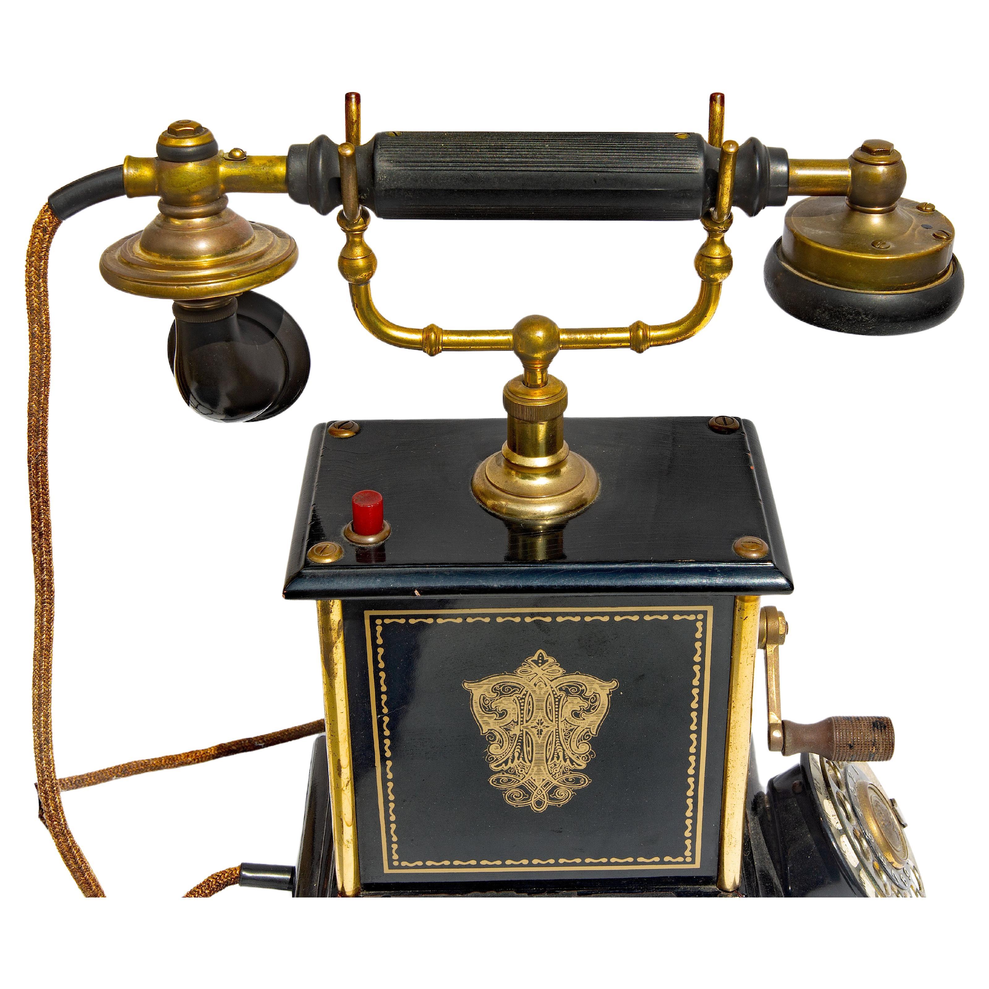 Fancy  brass , black lacquer with gilded decoration. A work of art. Swedish Coat of arms on dial. . Circa 1910. Working condition. Made by L.M. Ericsson, Stockholm, Sweden.