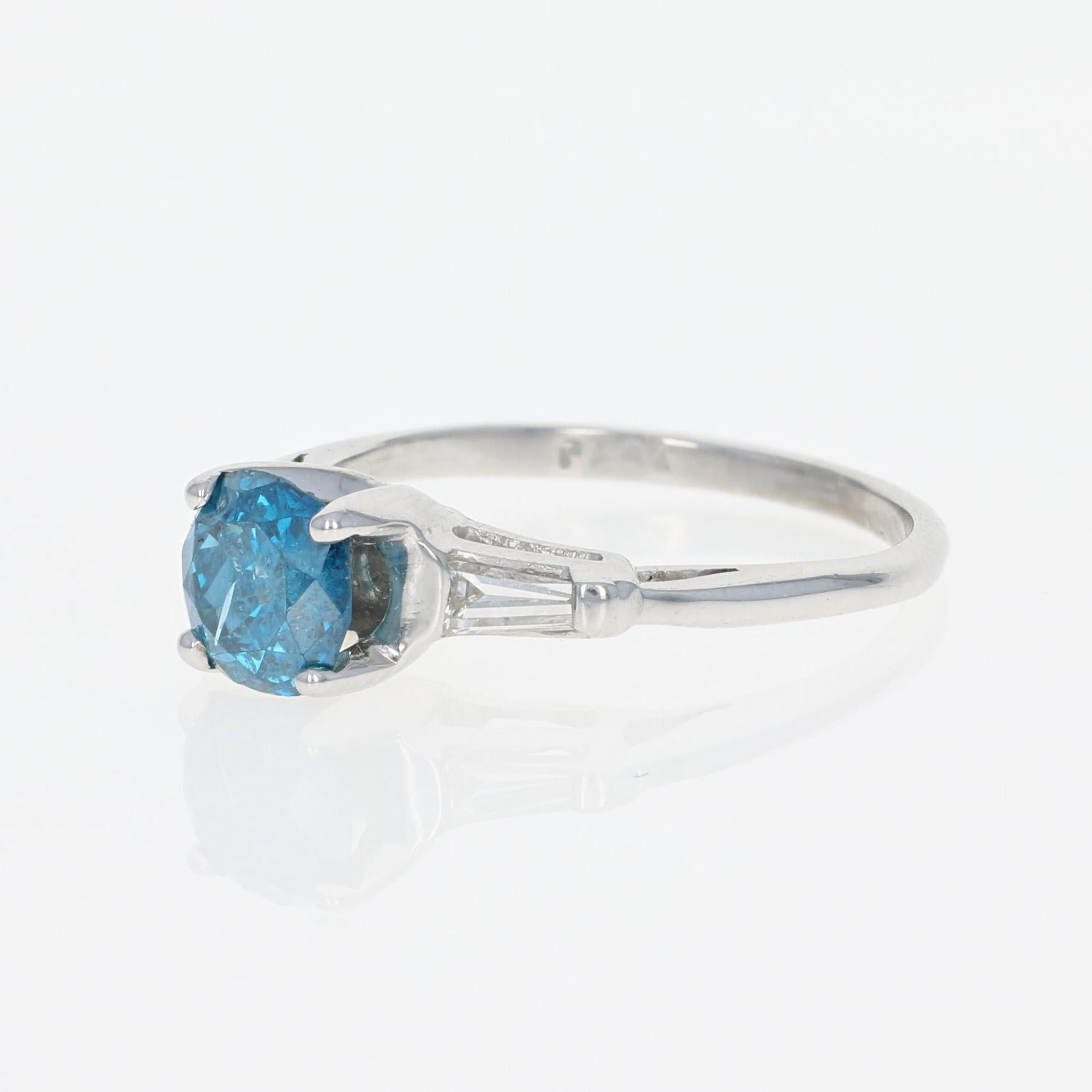 The bride who likes the tradition of diamonds but dreams of something uniquely hers will love this engagement ring! Fashioned in platinum, a precious metal prized for its strength and enduring beauty, this piece features a Fancy Blue diamond