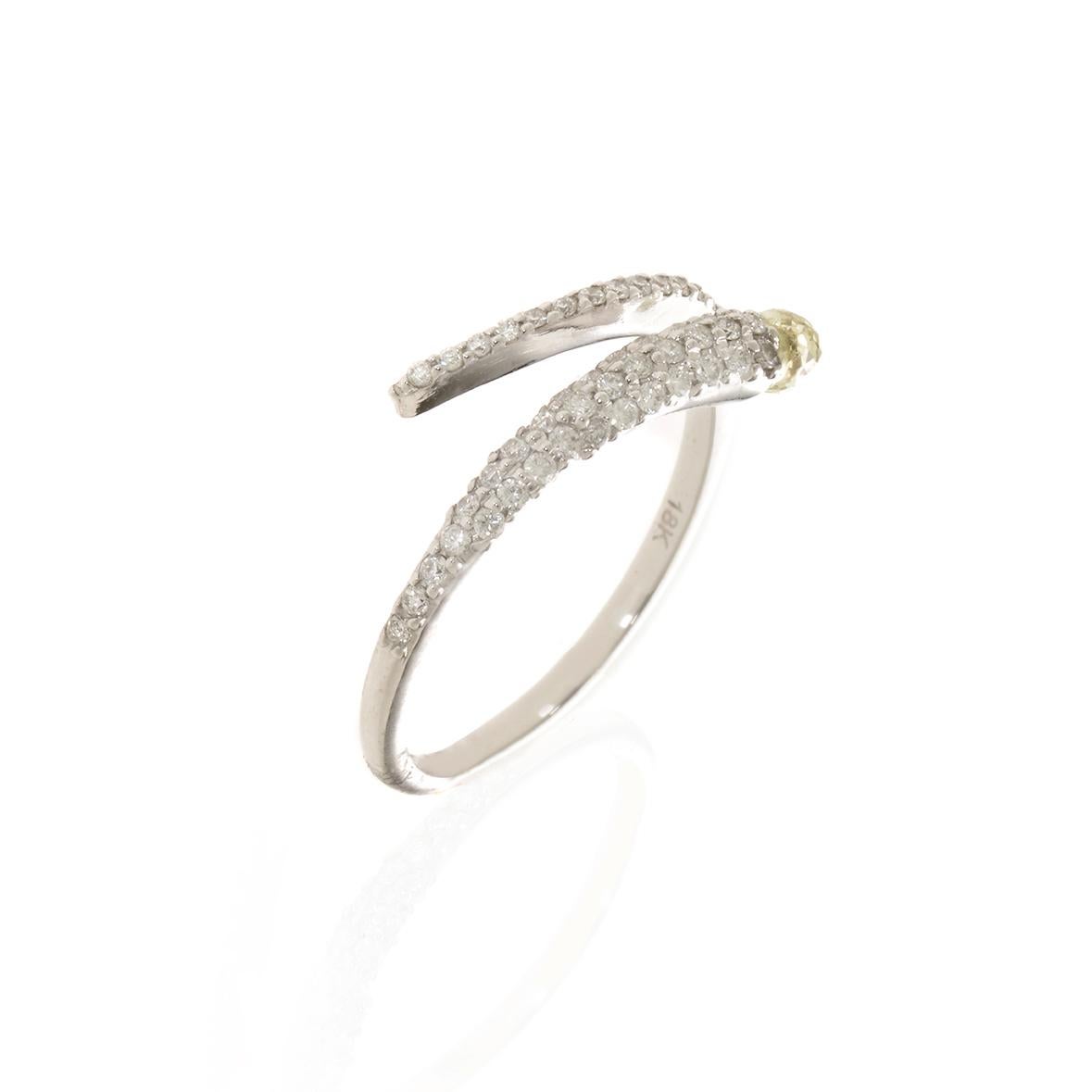 Fancy Briolite and Yellow Diamond ring in 18 k white gold.