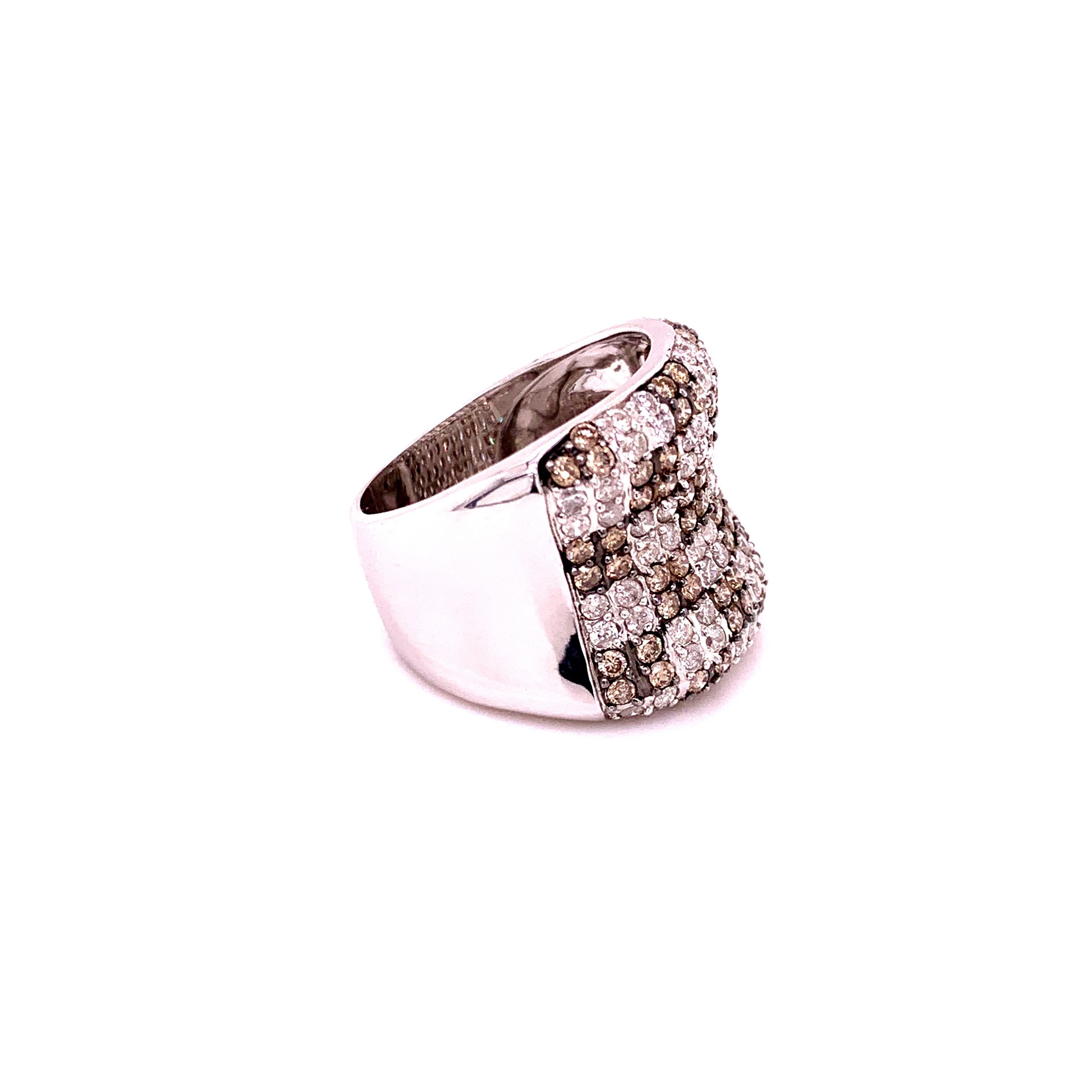 Stunning fancy brown diamond cocktail ring. High lustre, a round brilliant cut fancy brown diamond with round brilliant cut diamond mounted in an oxidized checkered pattern.  Handcrafted beautiful wide band design set in high polished 14 karats