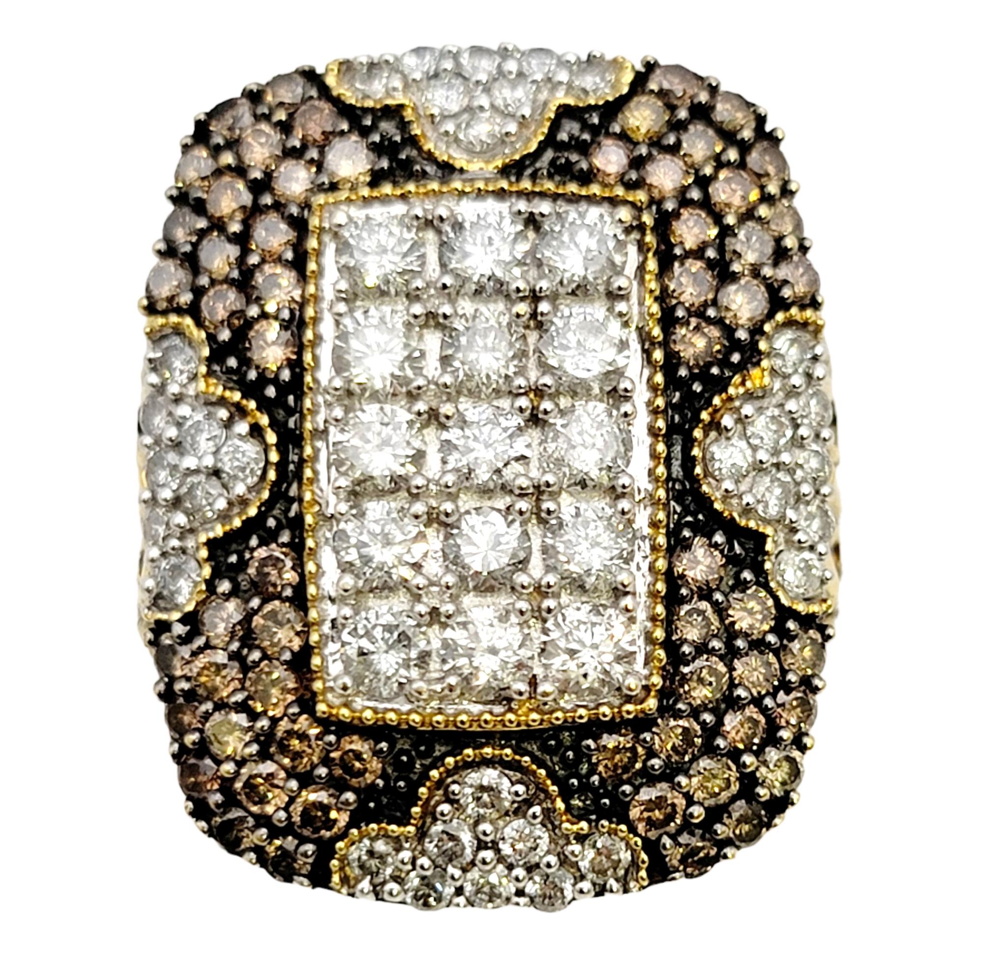 Ring size: 8.5

Featured here is a shimmering statement piece that will fill the finger with sparkle. This lovely contemporary cocktail ring features a glittering natural diamond tablet at the center surrounded by fancy brown pave diamonds and