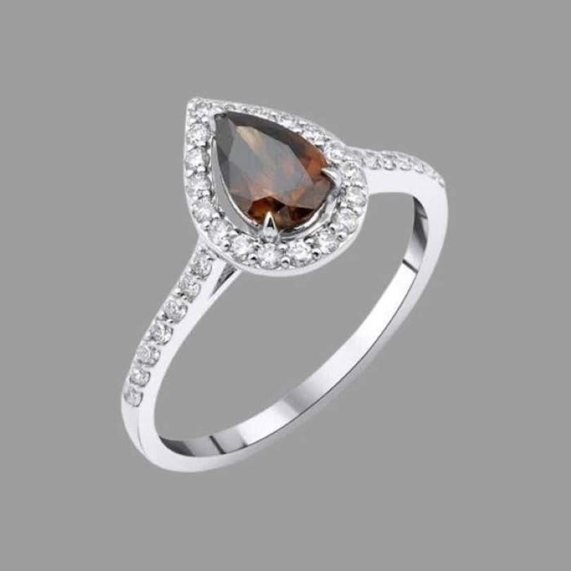 Product Details :

• Made to Order

• Gold Kt: 14kt

• Available Gold Colors: Rose Gold, Yellow Gold, White Gold

• 0.35ct  Natural Round Side Diamond

• 0.78ct  Natural Brown Pear Fancy Diamond

• Diamond Color-Clarity: F-G Color VS/SI Clarity

•