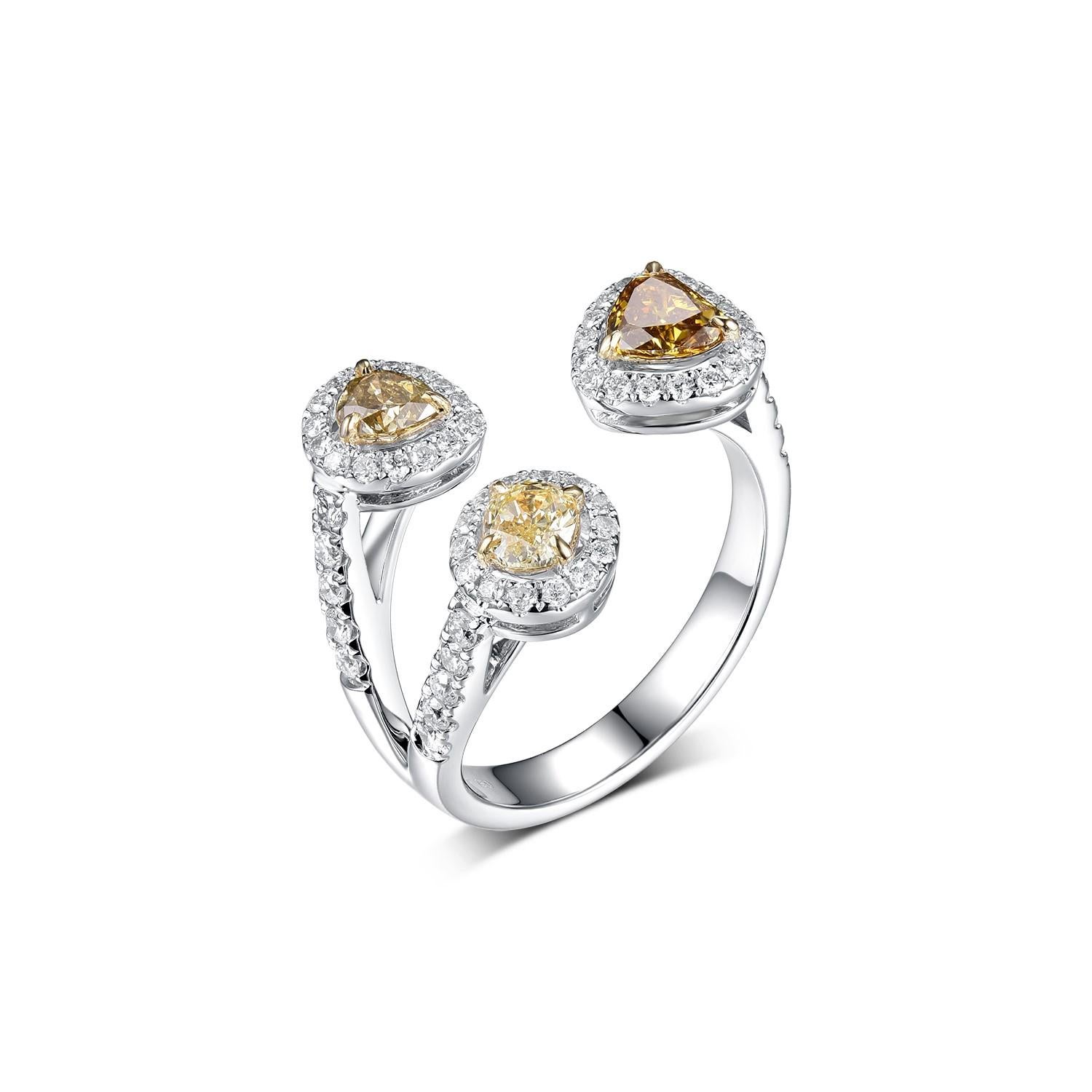 This ring features 0.81 carat of fancy yellow diamonds and 0.47 carat of round diamonds set in a bypass design. Diamonds are set in 18 karat white gold and the body of the ring is made with 18 karat white and rose gold. Resizing is available.
US
