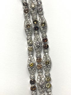 Fancy Color Diamond and White Diamond Bracelet in Platinum