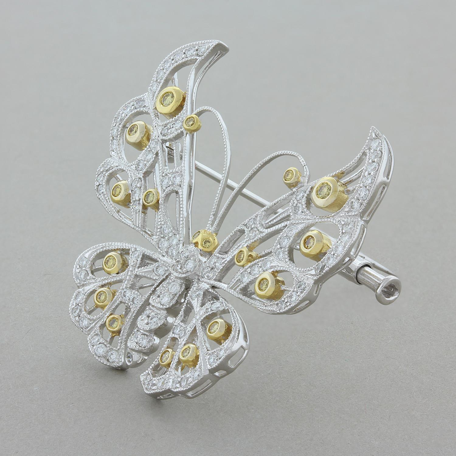 This flying proud butterfly brooch features 1.26 carats of round brilliant cut diamonds, fancy yellow and colorless. The fancy yellow diamonds are set in 18K yellow gold and the colorless diamonds are set in 18K white gold giving the pieces a great