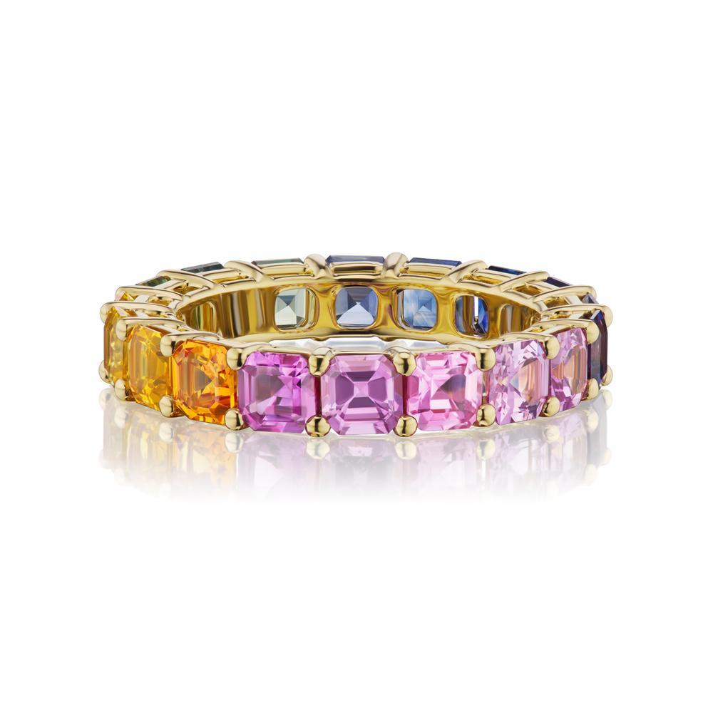NATURAL FANCY COLOR SAPPHIRE ETERNITY BAND
Gorgeous Multi-Colored Fancy Sapphire Eternity Band. It’s a funky ring for women. ( Ring Size 6.5 )
Item:	# 03791
Setting:	18K Y
Color Weight:	5.54 ct. of Fancy Color Sapphire