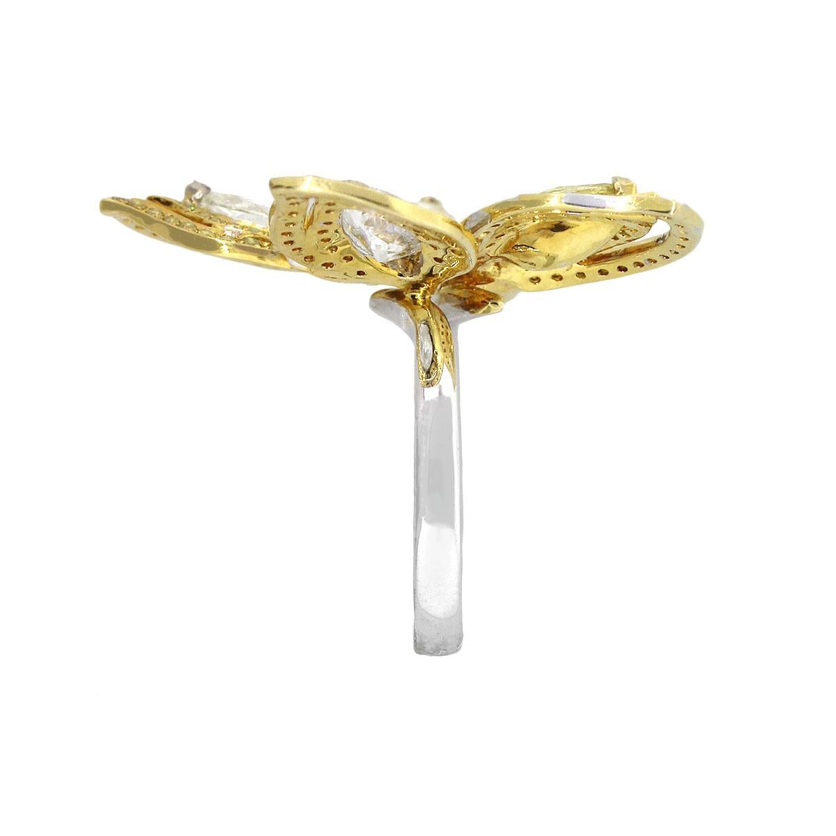Material: 18k White Gold and Yellow Gold
Diamond Details: 
Approx. 4.19ctw of Marquise & Heart shaped diamonds. Diamonds are fancy yellow and G/H in color, SI in clarity.
Approx. 1.11ctw of Round Brilliant diamonds. Diamonds are fancy yellow in