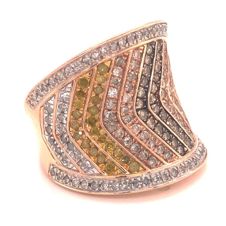 Fancy colored diamond saddle ring in 10k rose gold. The ring features alternating rows of 196 white, yellow and champagne colored diamonds, pave set, totaling ~1.00 carat. Fancy yellow diamonds appear to be color enhanced. The ring width is 20.5 mm