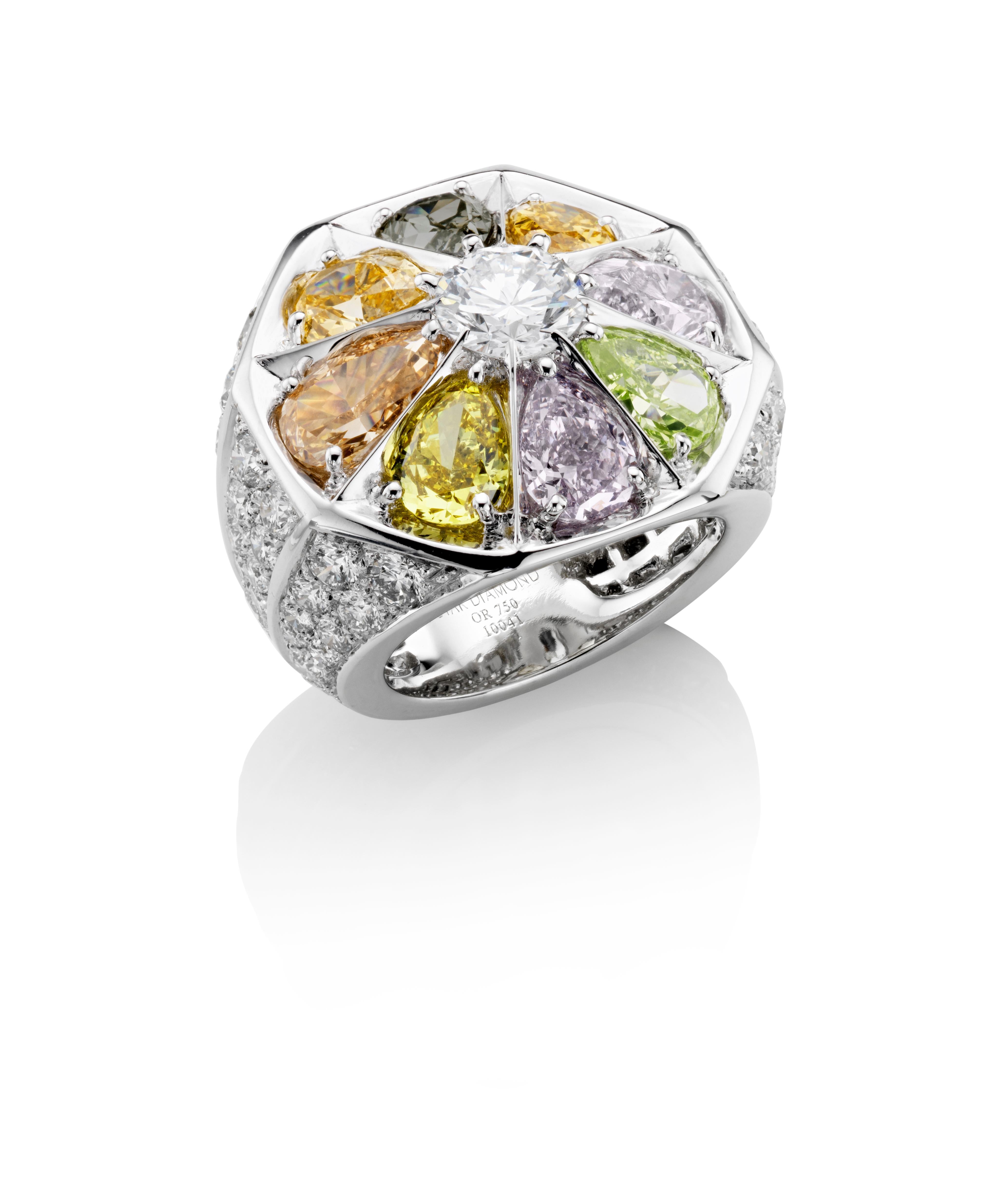 A Fancy Coloured & White Diamond Ring Set in 18K White Gold.

A Galactic explosion of light and colour that makes this ring a dazzling wonder of some of the earths most beautiful diamonds, a bold and contemporary jewel.

87 diamonds totalling 11.19