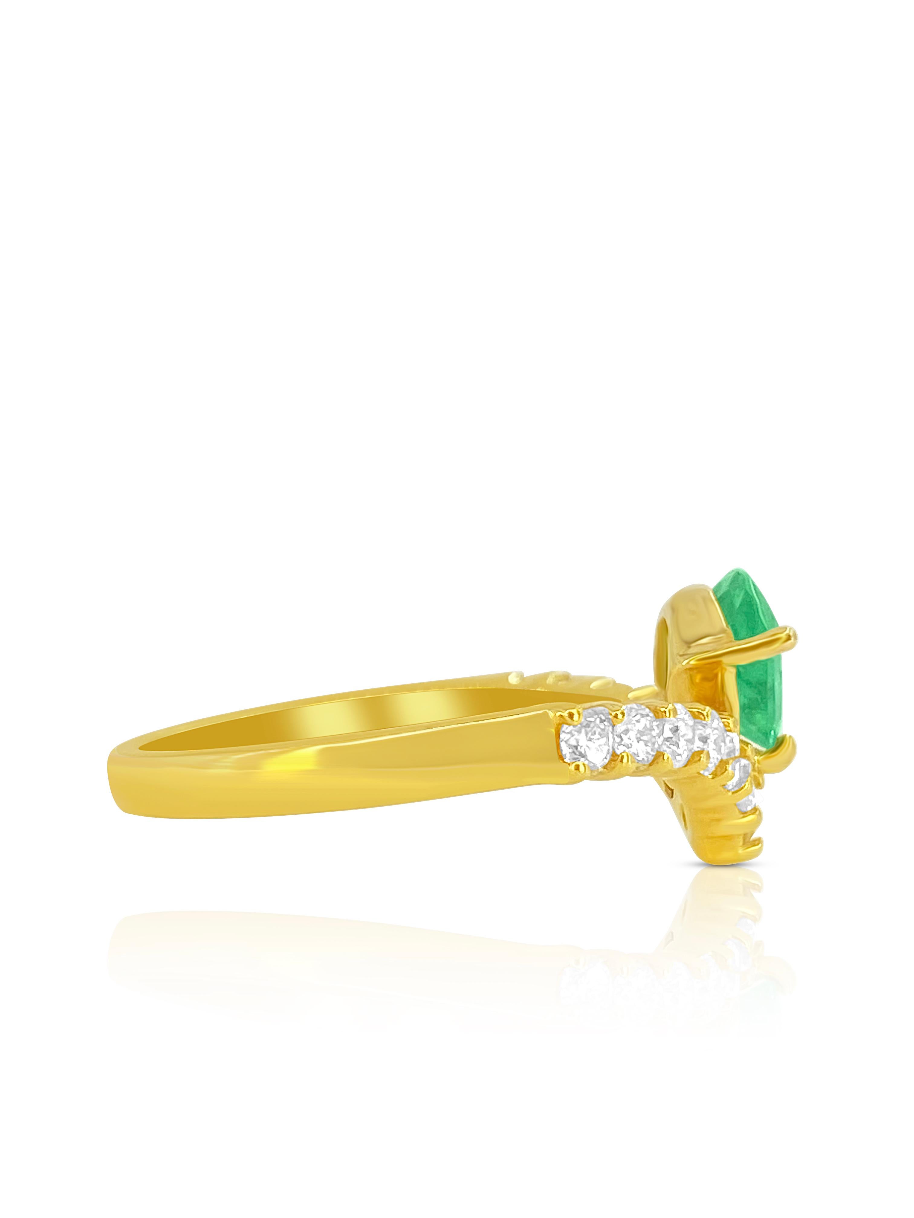 Unique kite shape natural Colombian Emerald mounted in 18k gold and set on a curved regal band with luminous natural diamonds. This gorgeous Nouveau ring has art deco inspirations and was handmade by our in-house jewelers. 
 
✔ Natural