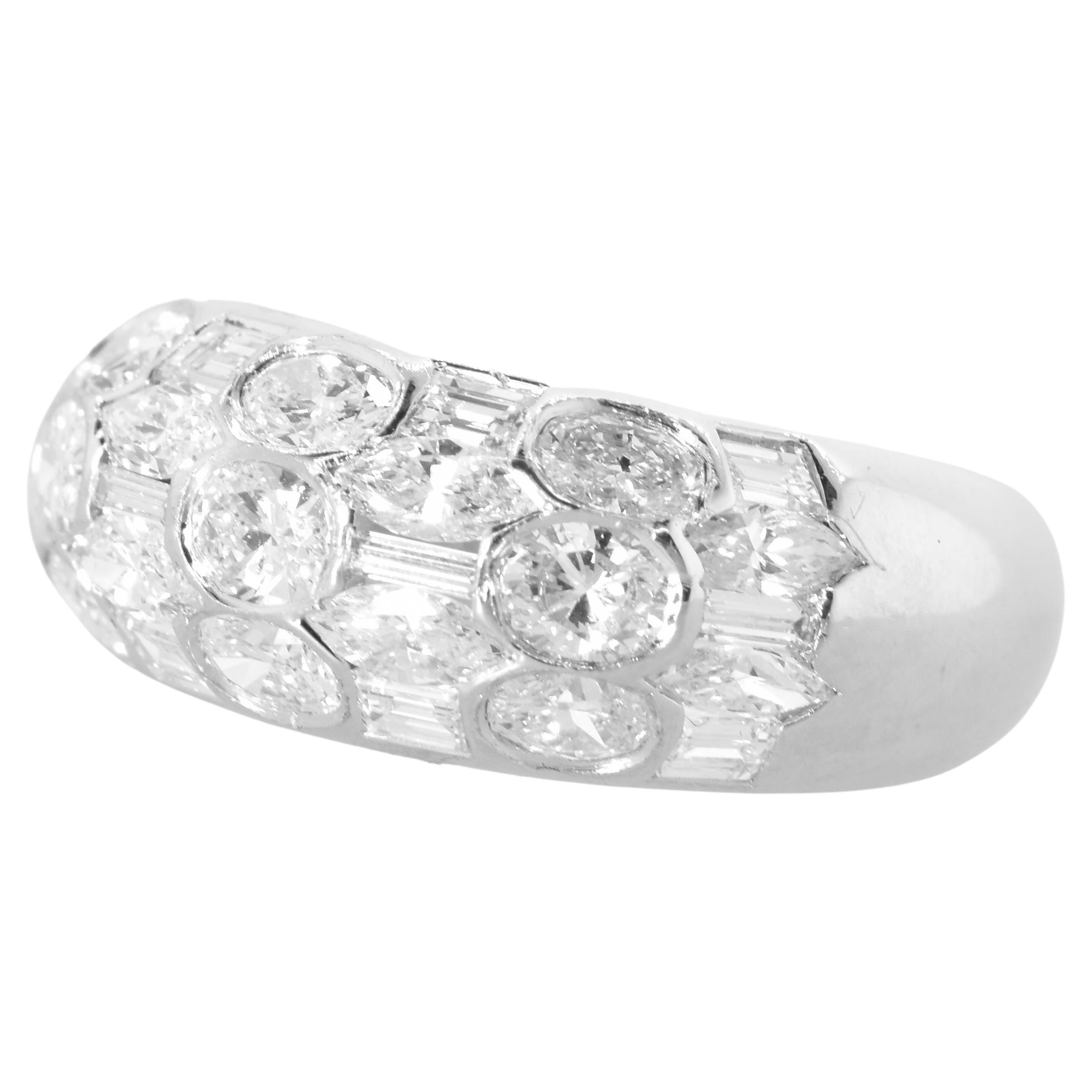 Diamond dome ring with 29 stones amounting to an estimated 2.50 cts of fine white fancy cut diamonds - all near colorless (G/H), and very slightly included (VS1). The diamonds are well matched in quality.  There are 4 different cuts: oval cut,