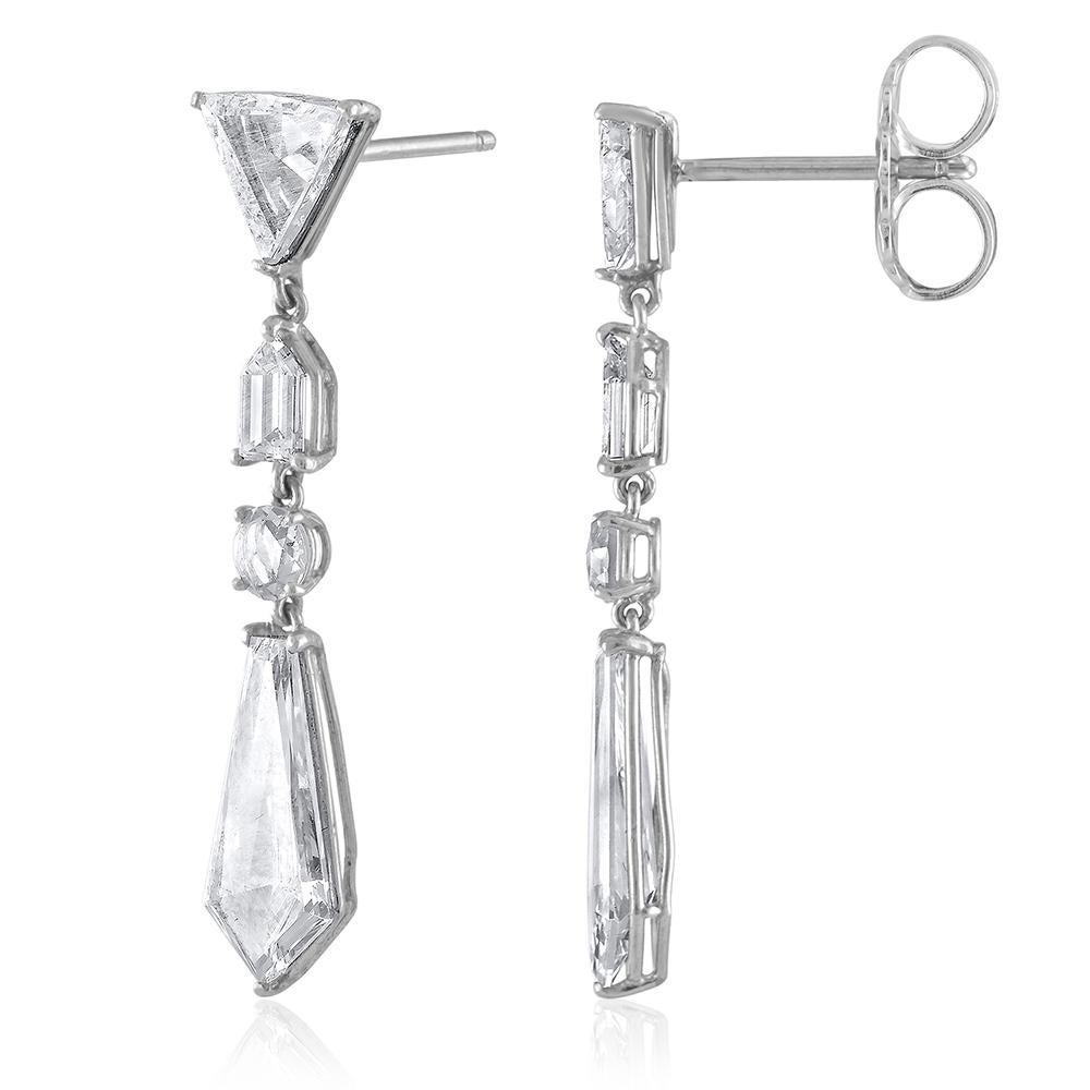 Rare fancy cut diamond earrings, each earring set with a dramatic kite-shape diamond 1.31 cts, each suspended in platinum with a rose-cut, bullet-cut and triangular diamond at top, tw approx. 3.75 cts.  The earrings measure 1/4