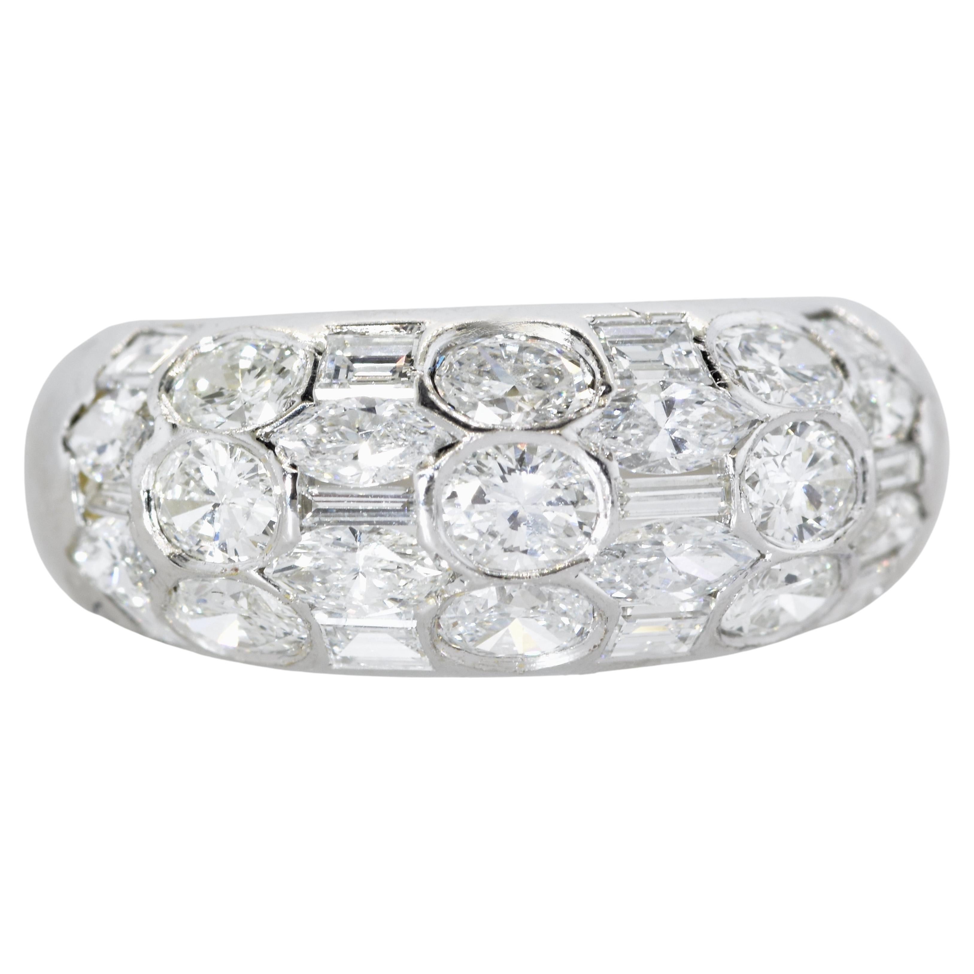 Diamond dome ring with 29 stones amounting to an estimated 2.50 cts of fine white fancy cut diamonds - all near colorless (G/H), and very slightly included (VS1). The diamonds are well matched in quality.  There are 4 different cuts: oval cut,