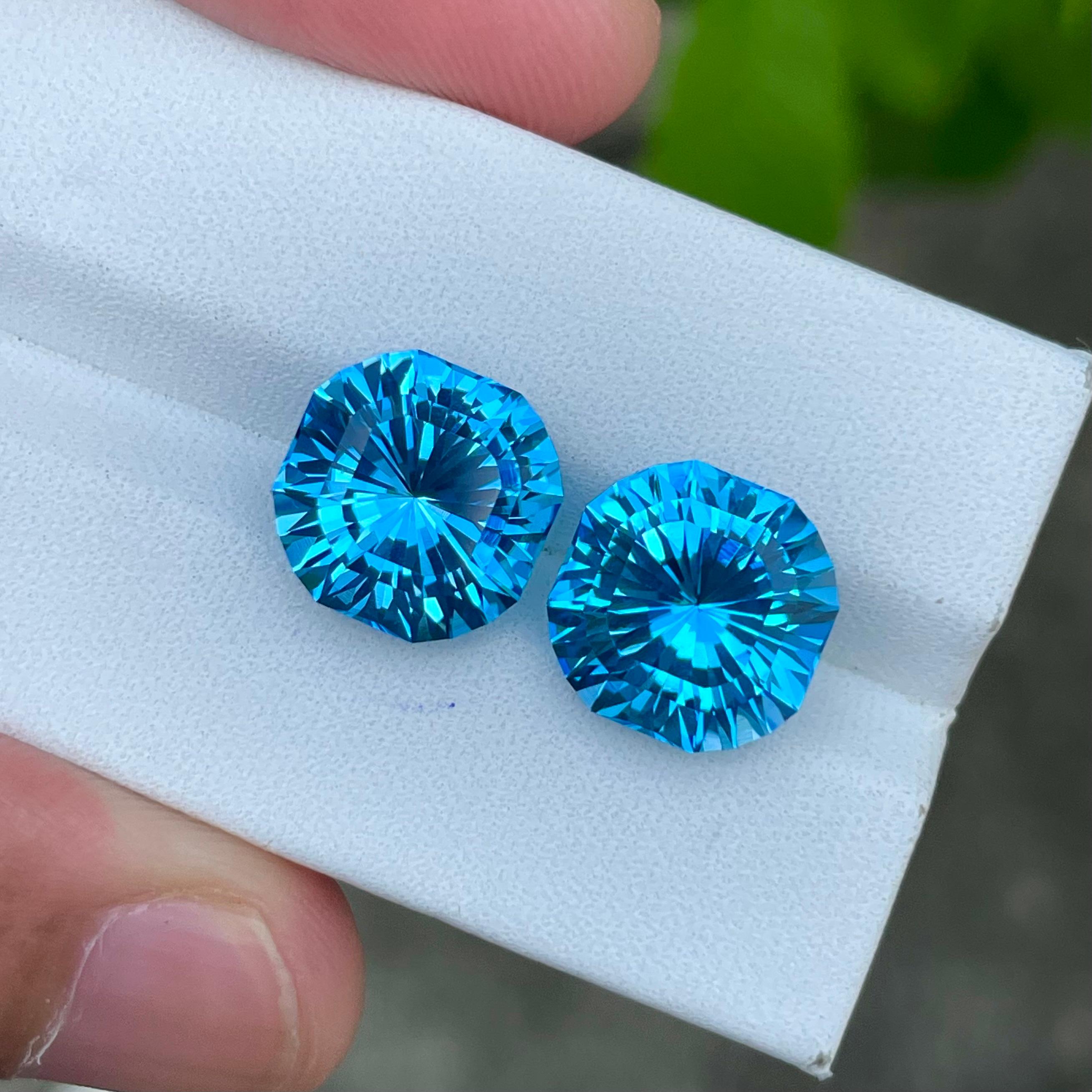 Weight 13.90 carats 
Dimensions 11.2 x 11.2 x 7.7 mm
Treatment Heated 
Origin Madagascar 
Clarity Loupe Clean 
Shape Octagon 
Cut Custom Precision 



Elevate your jewelry collection with this exquisite pair of Fancy Cut Neon Blue Topaz gemstones,