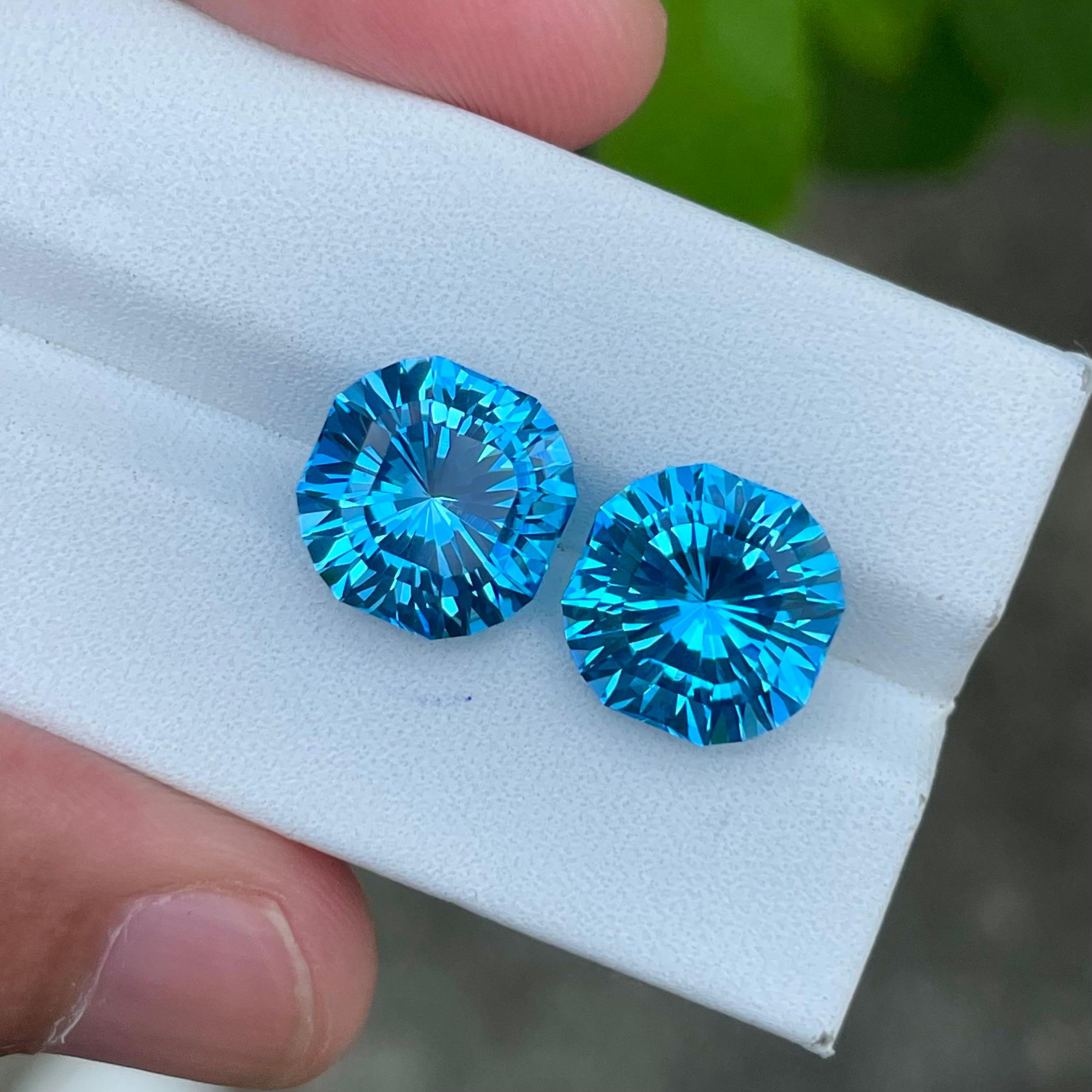 Modern Fancy Cut Neon Blue Topaz Pair 13.90 carats Natural Madagascar's Gemstones For Sale