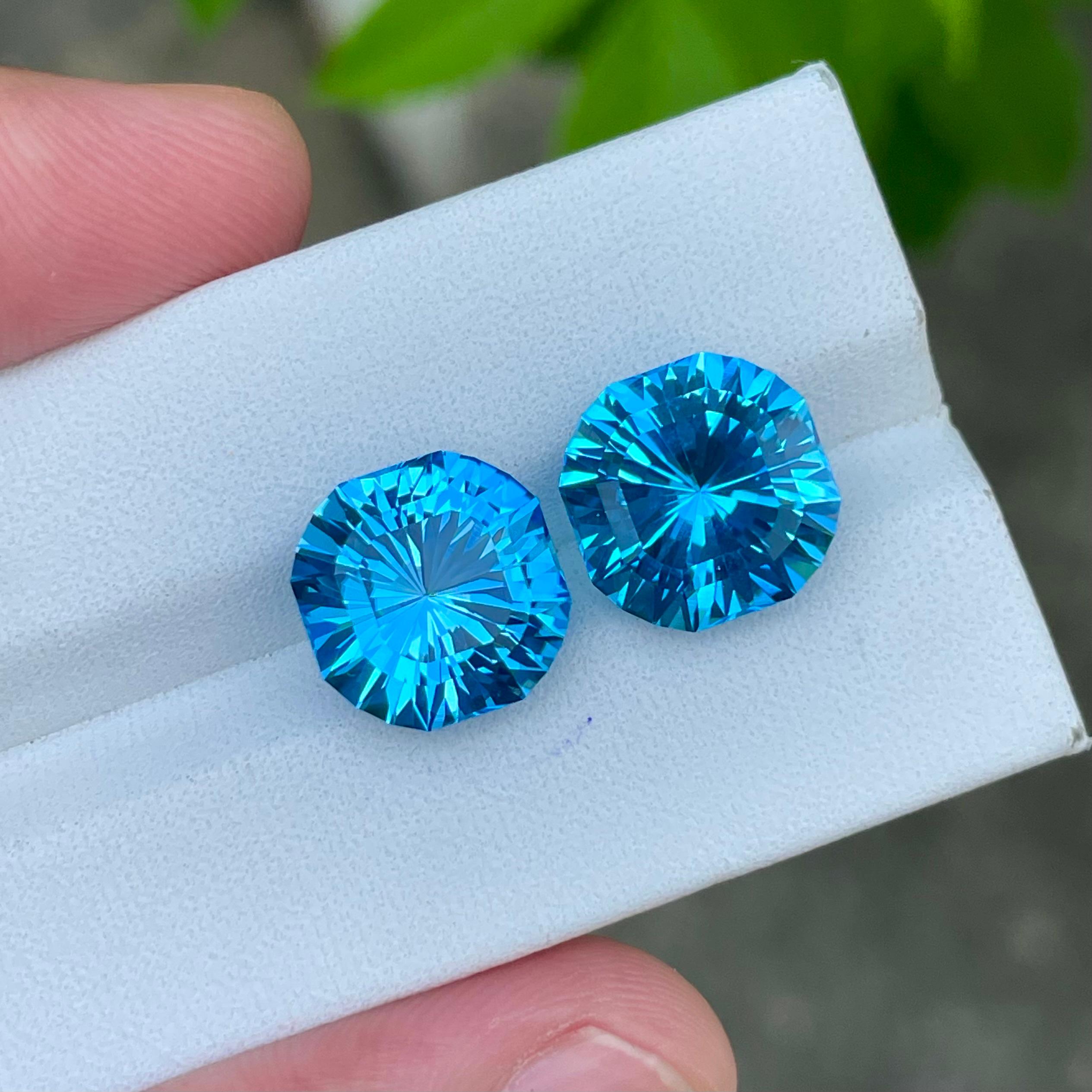 Mixed Cut Fancy Cut Neon Blue Topaz Pair 13.90 carats Natural Madagascar's Gemstones For Sale