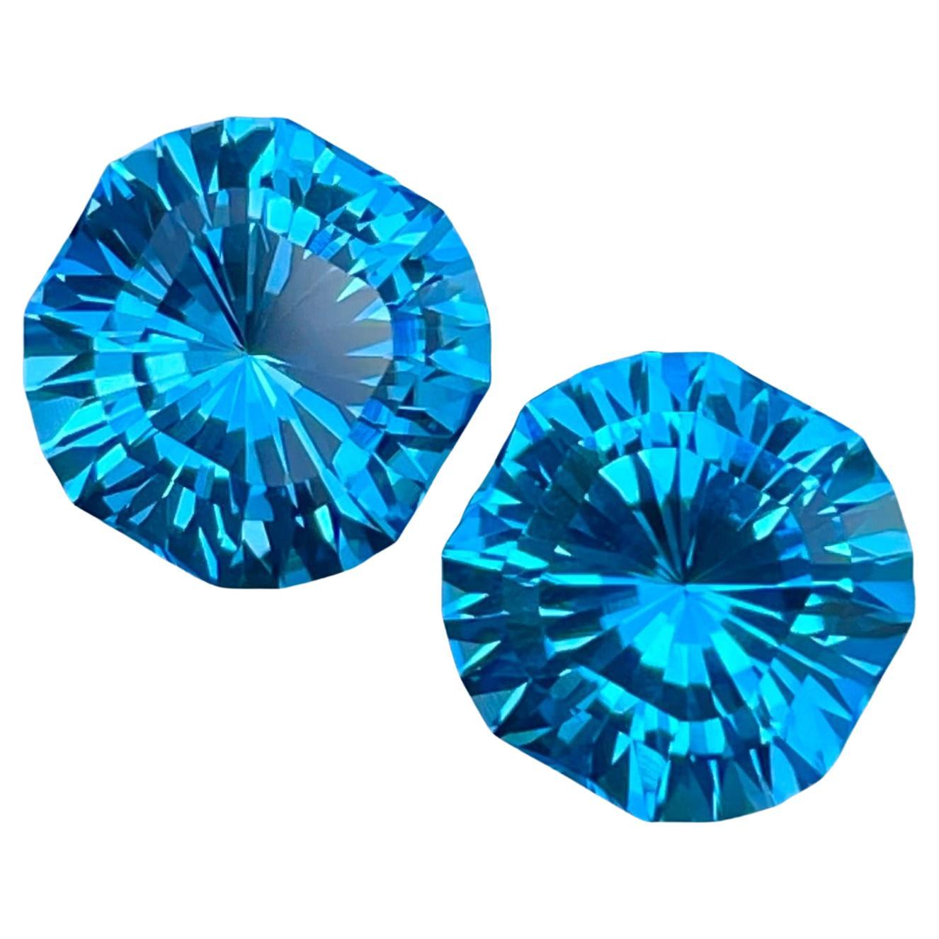 Fancy Cut Neon Blue Topaz Pair 13.90 carats Natural Madagascar's Gemstones For Sale