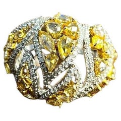 Anillo de oro blanco de 18 quilates con diamante blanco y zafiro amarillo de corte fantasía
