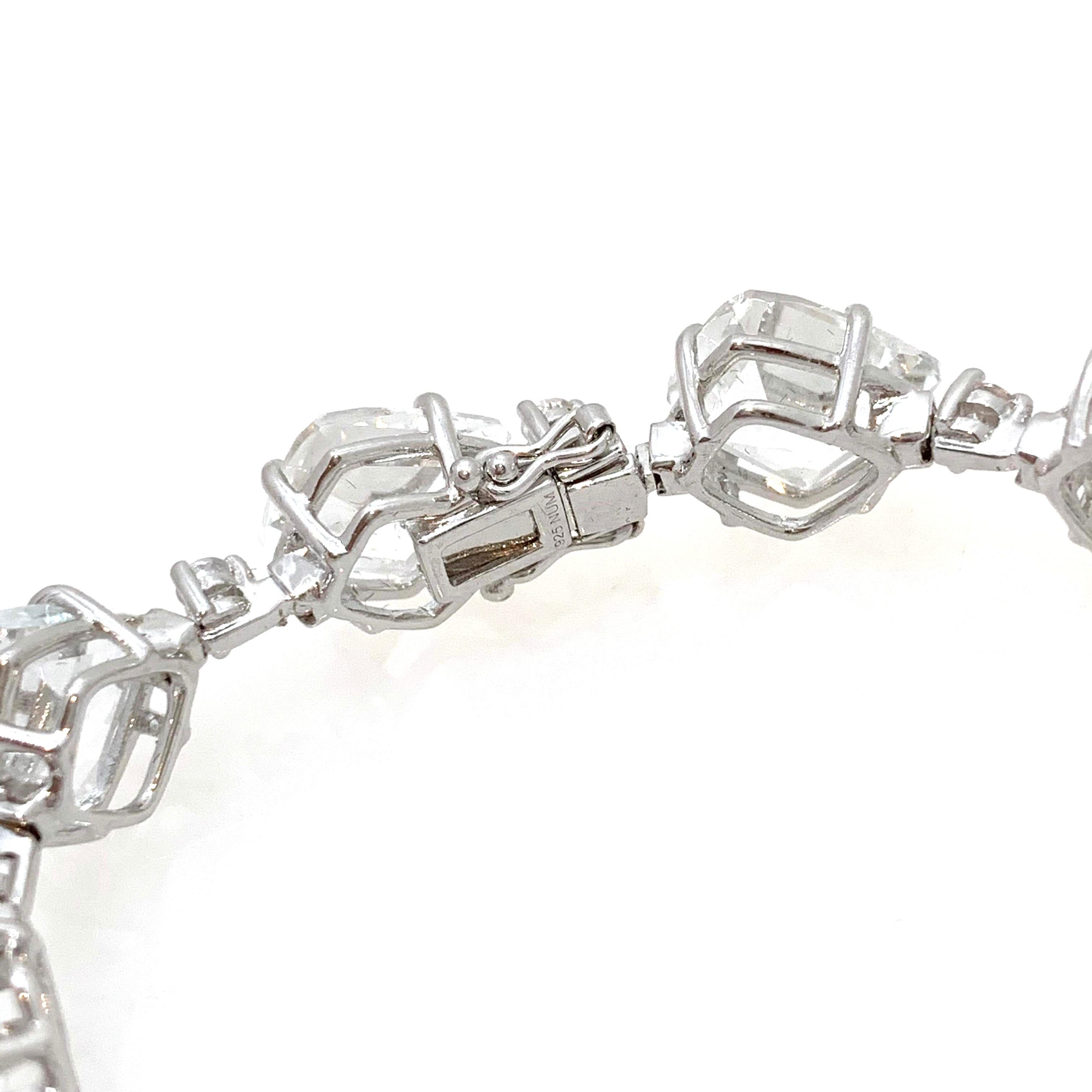 Contemporary Fancy-cut White Topaz and White Sapphire Tennis Bracelet For Sale