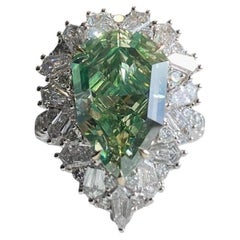 Bague diamant poire gris foncé et jaune verdâtre 7 carats SI1 certifié GIA