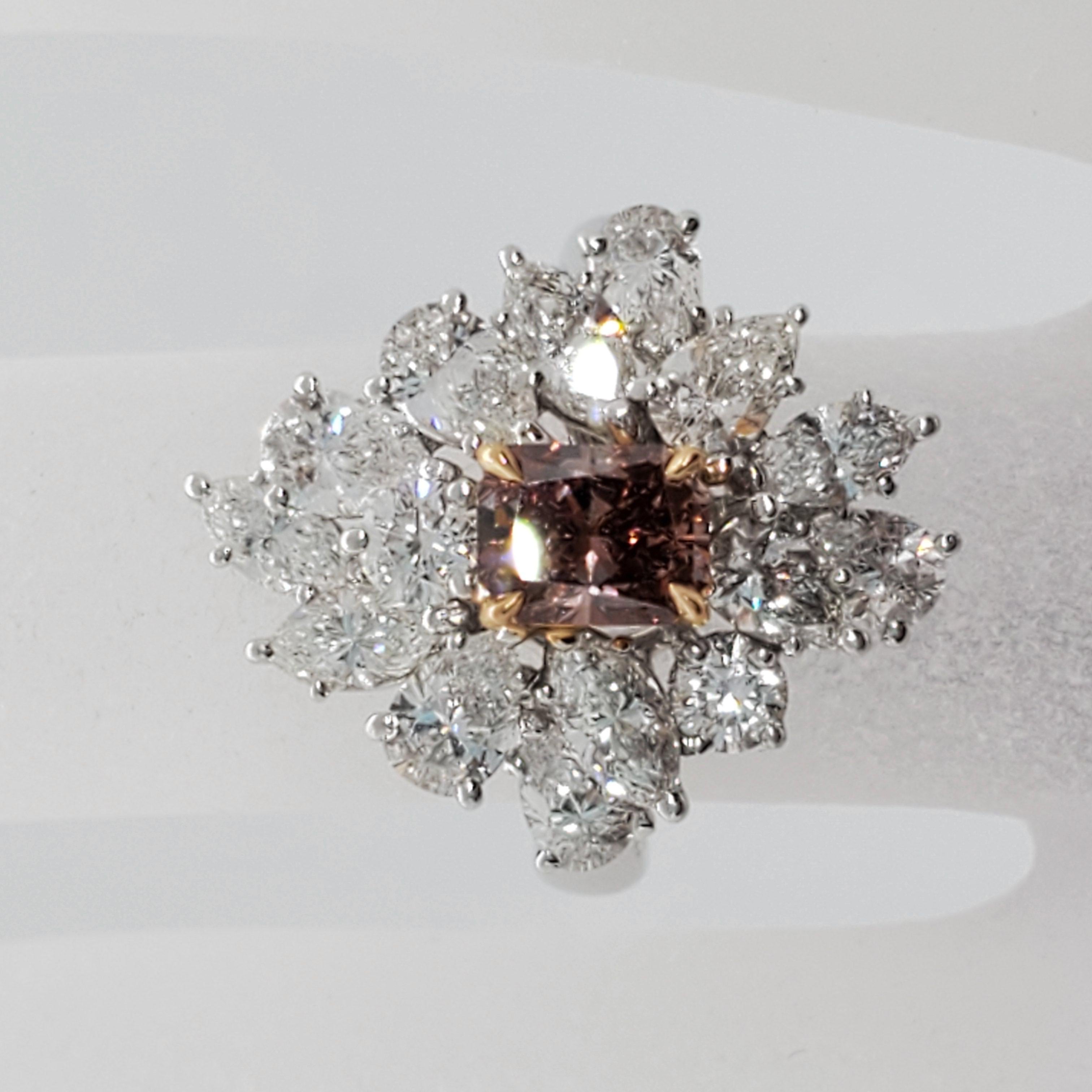 Gorgeous 0.86 ct fancy deep brown pink diamond radiant with 2.33 ct of good quality white diamond marquise, pear shapes, and rounds in a handcrafted 18k yellow gold and platinum mounting.  Size 5.5.  GIA Lab Report 16353492