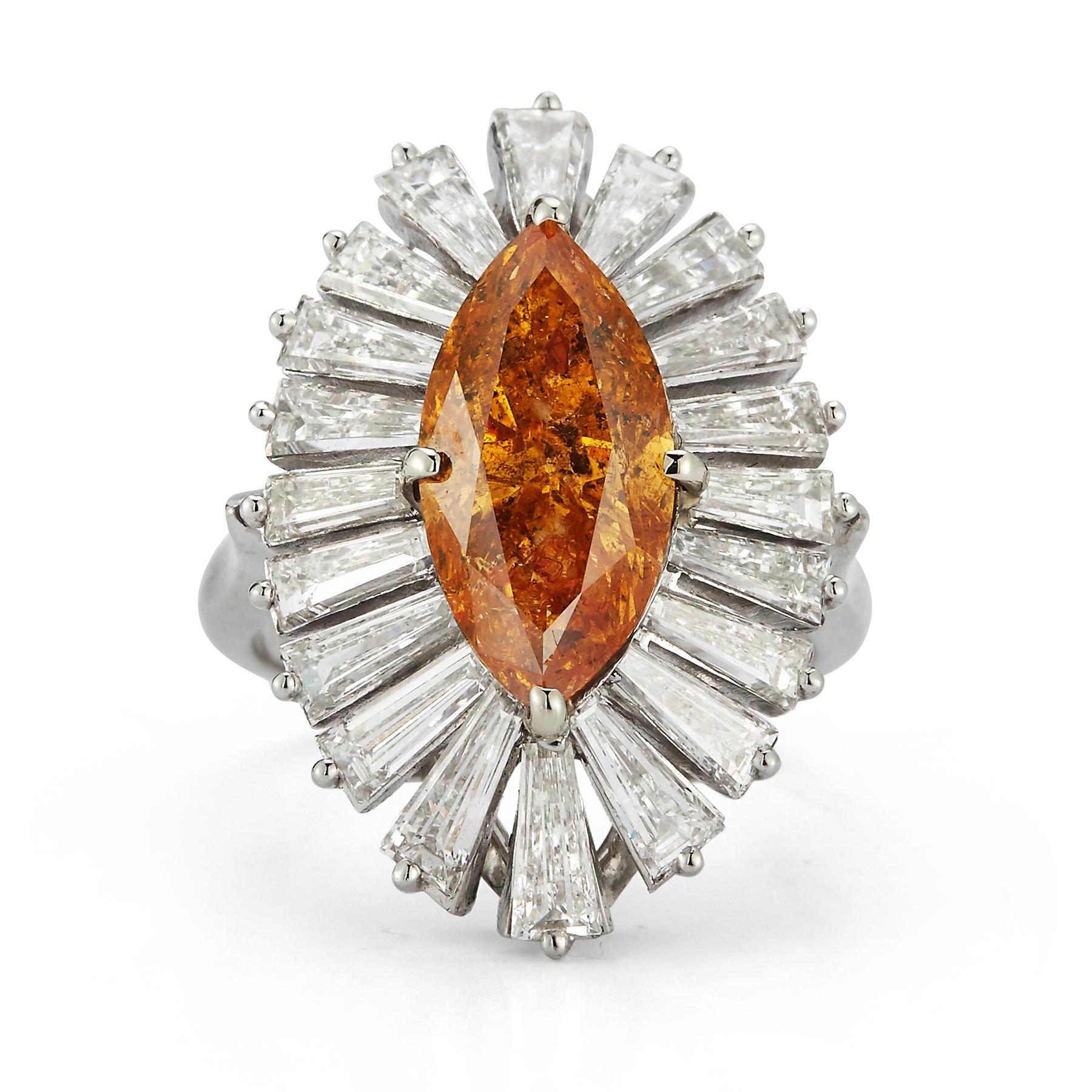 GIA Certified Fancy Deep Orange Yellow  Marquise & Baguette Cut Diamond Ballerina Ring  

3.20 carat marquise cut diamond surrounded by baguette cut diamonds (2.71 carats) set in platinum

Ring Size: 5.25

Resizable free of charge 
