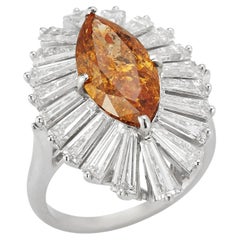Bague fantaisie orange foncé avec diamants taille marquise et baguette