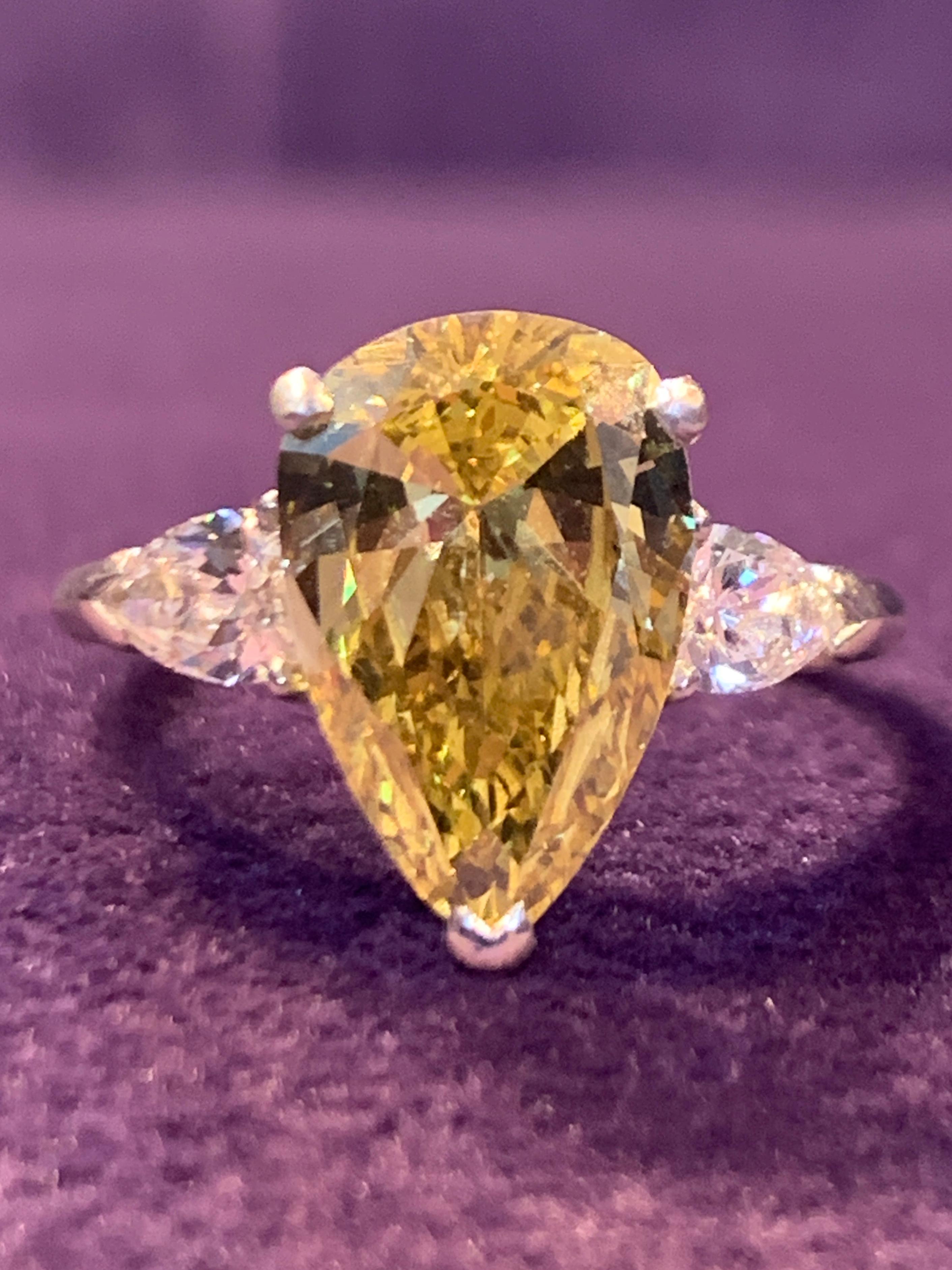 yellow pear diamond ring