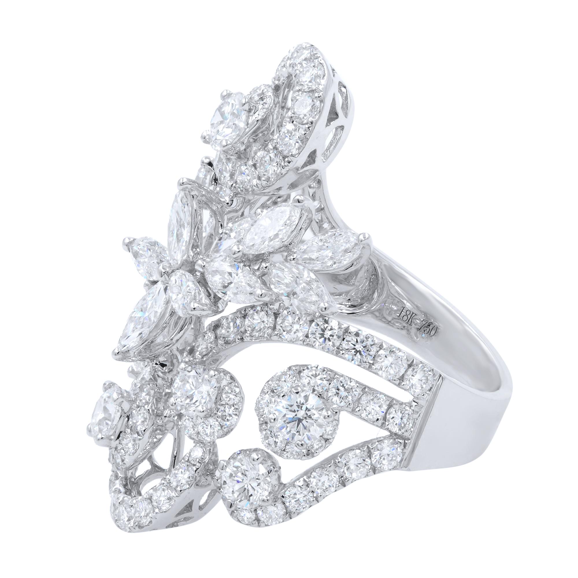 Marquise and round cut diamonds in lovely floral layout make a stunning presentation in one statement ring. Elegant cocktail ring that can be gifted features full cut white diamonds that sparkle in every light.
Ring Top Width: 21mm
Ring Top Length: