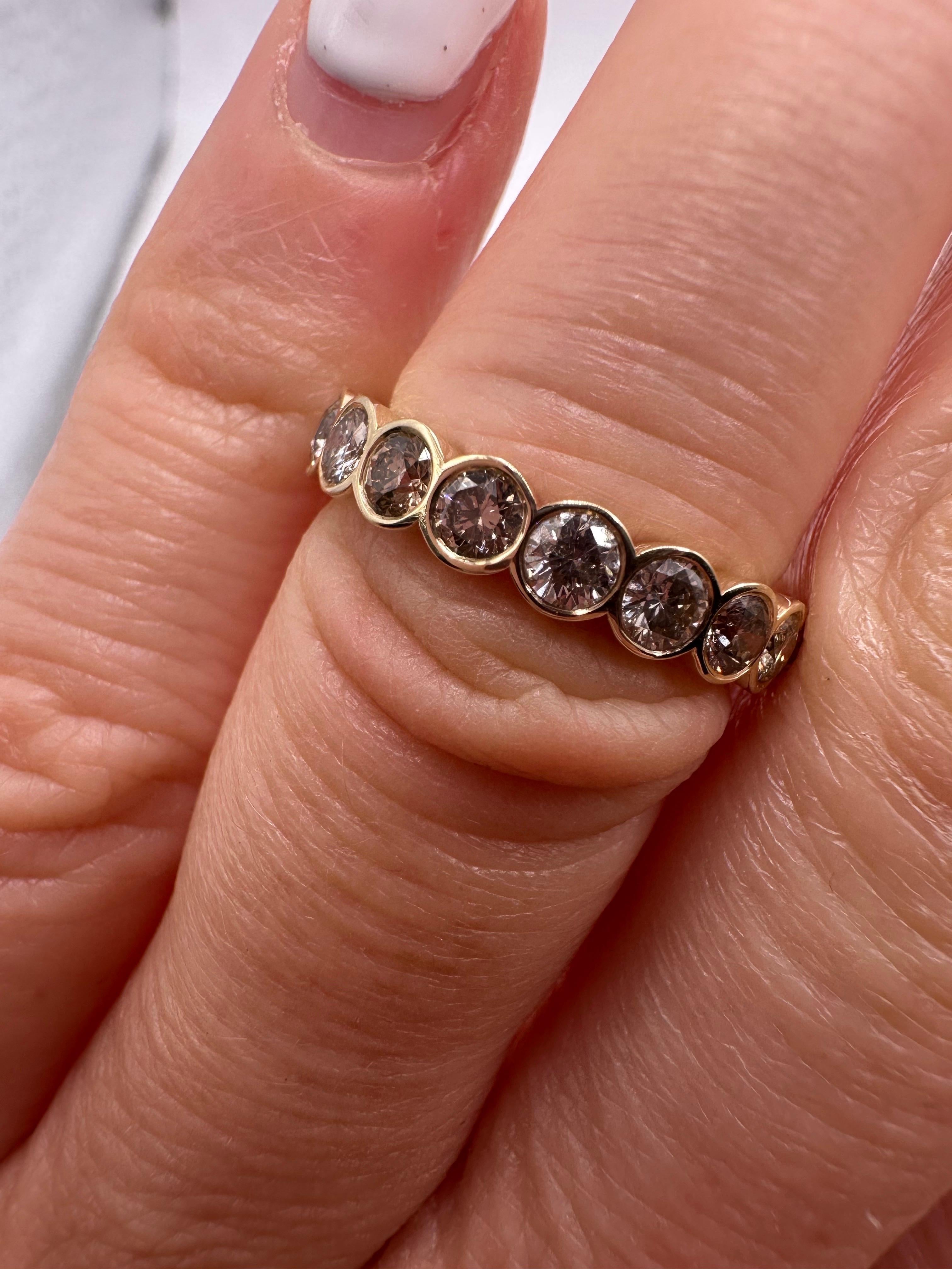Warm wedding band made with fancy brownish yellow diamonds also called champagne diamonds. Diamonds are app 3mm each. Very sparkly VS-SI clarity diamonds in eternity style, ring is size 6 and can be re-sized half size down or up.

**All items leave