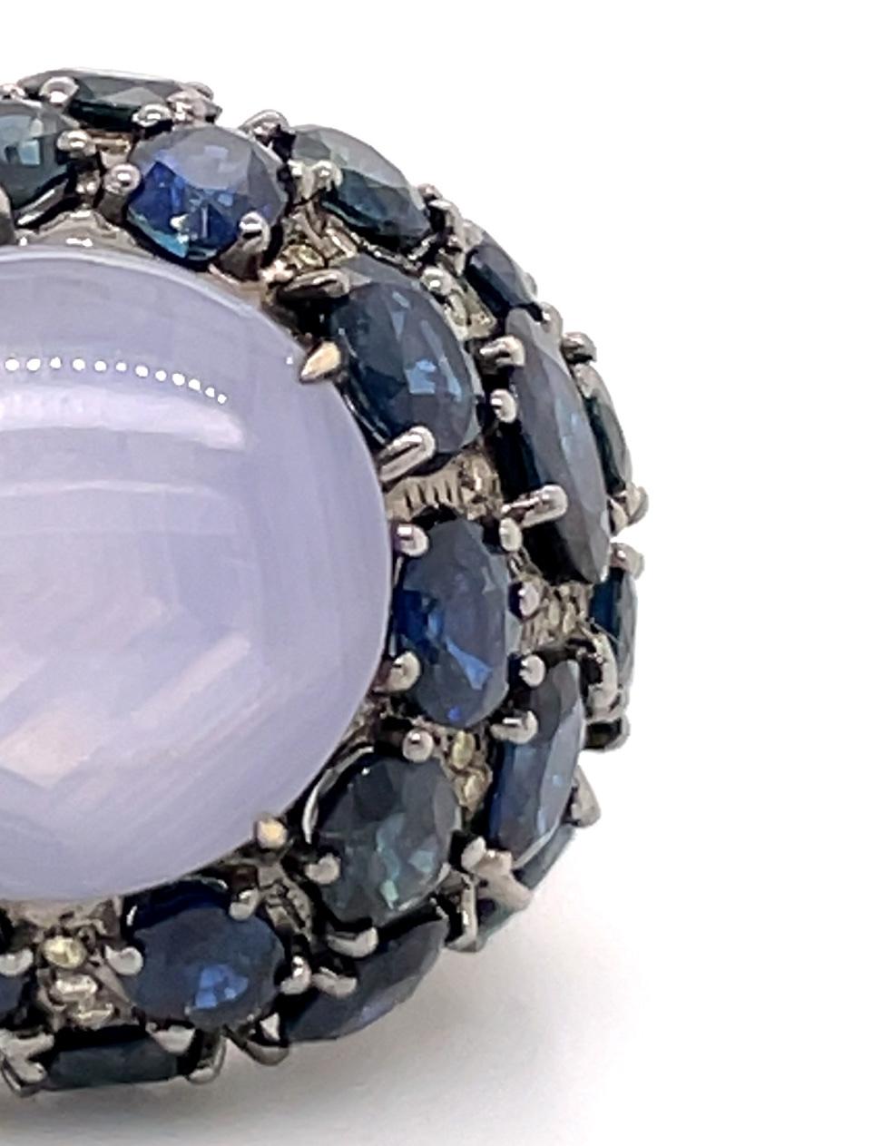 Fancy Diamonds and Sapphire Surrounded Star Sapphire Hues of Blue Ring In New Condition For Sale In Hong Kong, HK