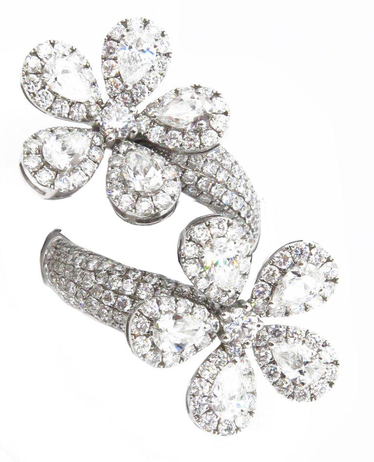 Bague en spirale à double fleur fantaisie Unisexe en vente