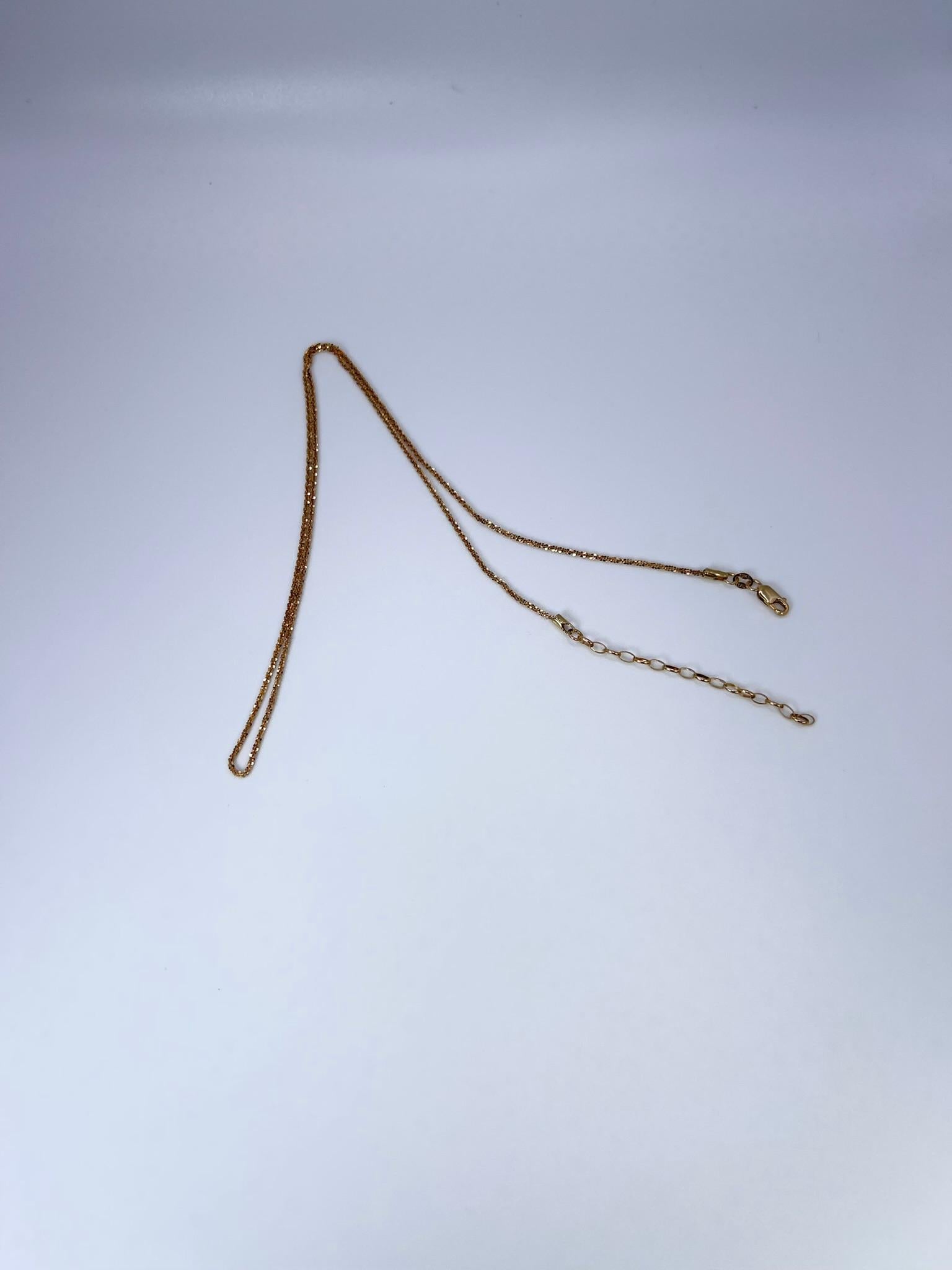 Rare fancy chain, plain solid gold. The chain sparkles on its own and is known as diamond cut chain.

GRAM WEIGHT: 2.10gr
GOLD: 10KT yellow gold
CLOSURE: Lobster
WIDTH: 1.1MM
LENGTH: 18