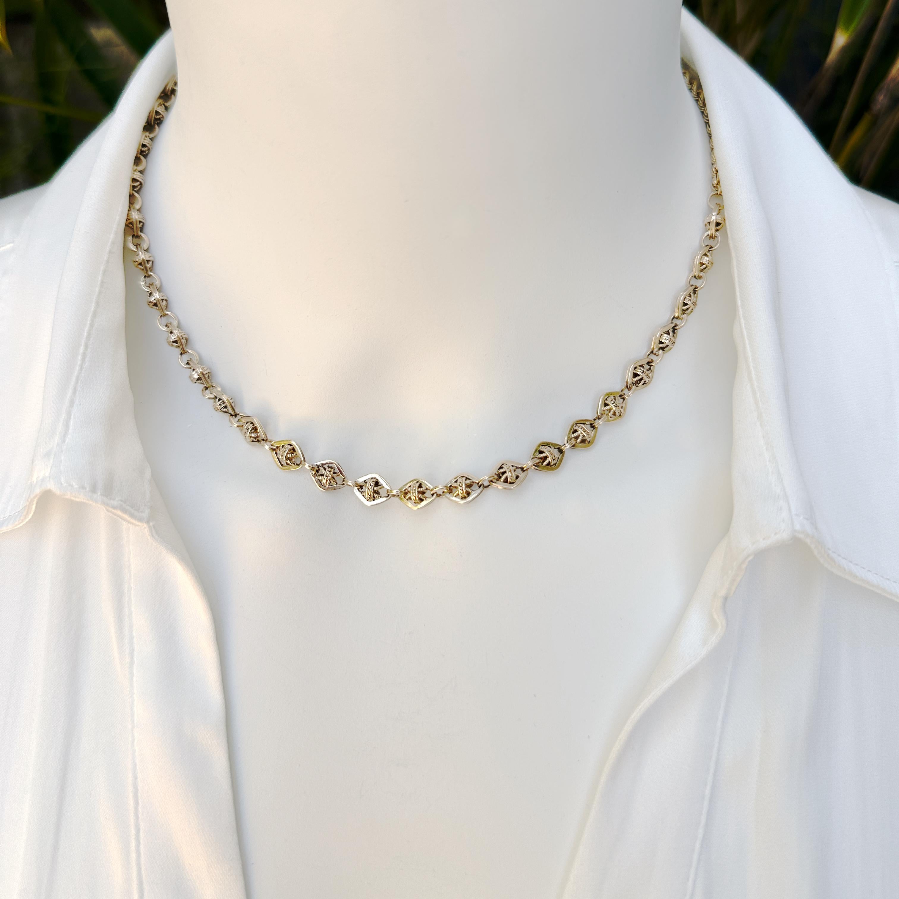 These fancy links came to us in two segments; someone had converted them to bracelets.  The Boss, Eytan Brandes, took both bracelets apart, yielding him thirteen inches of these delicious little doo-dads.  He made a couple of pairs of earrings