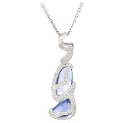 Fancy Gold Pendant with Diamonds and Natural Uncut Blue Sapphires