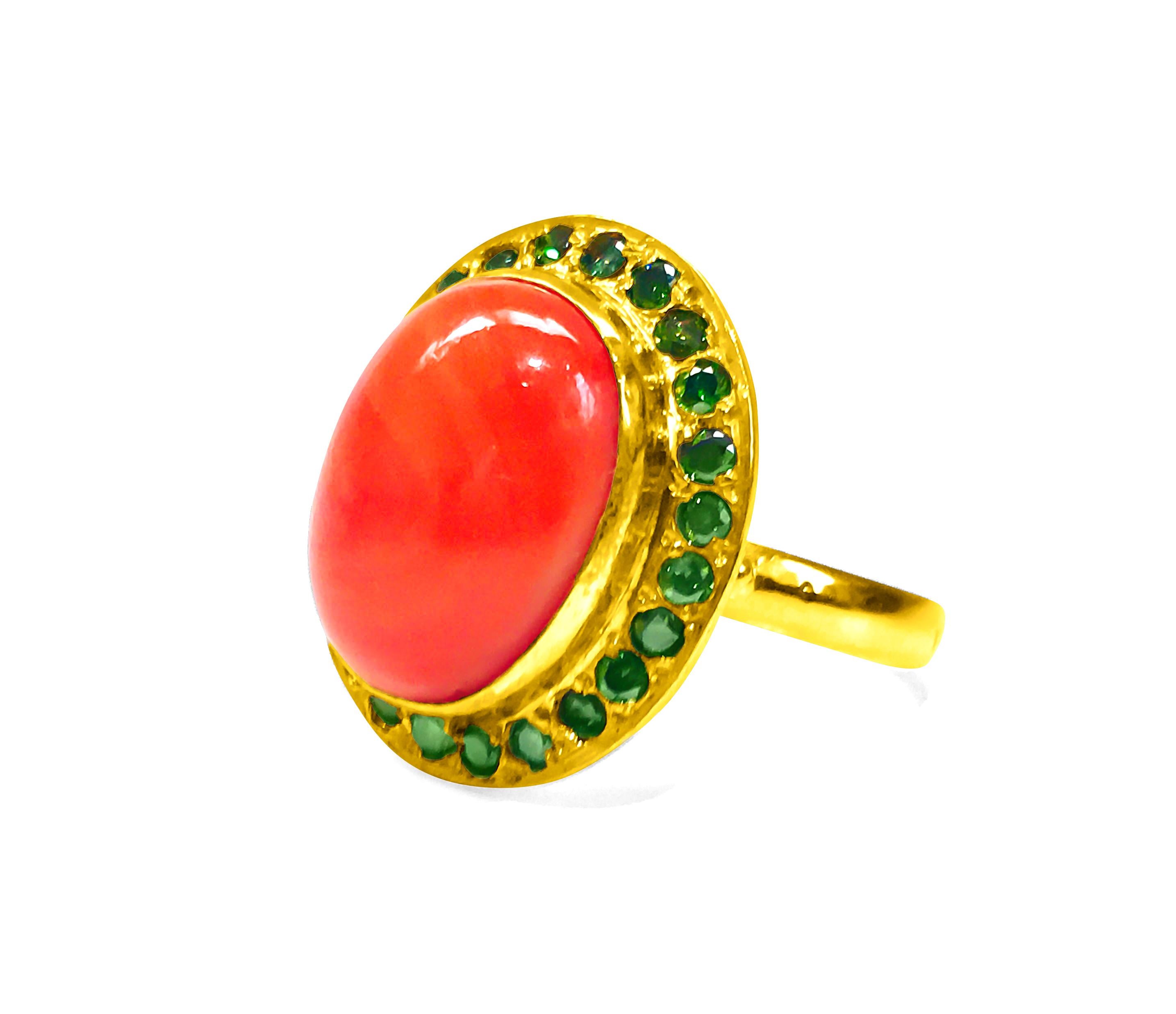  Metal: 21K Yellow Gold. 
5.50 carat natural coral, cabochon cut. 
1.00 carat diamonds. SI clarity - Fancy green color. Round brilliant cut. 
Center Stone set in bezel setting and the diamonds set in bead setting. 
Certified by GIA graduate