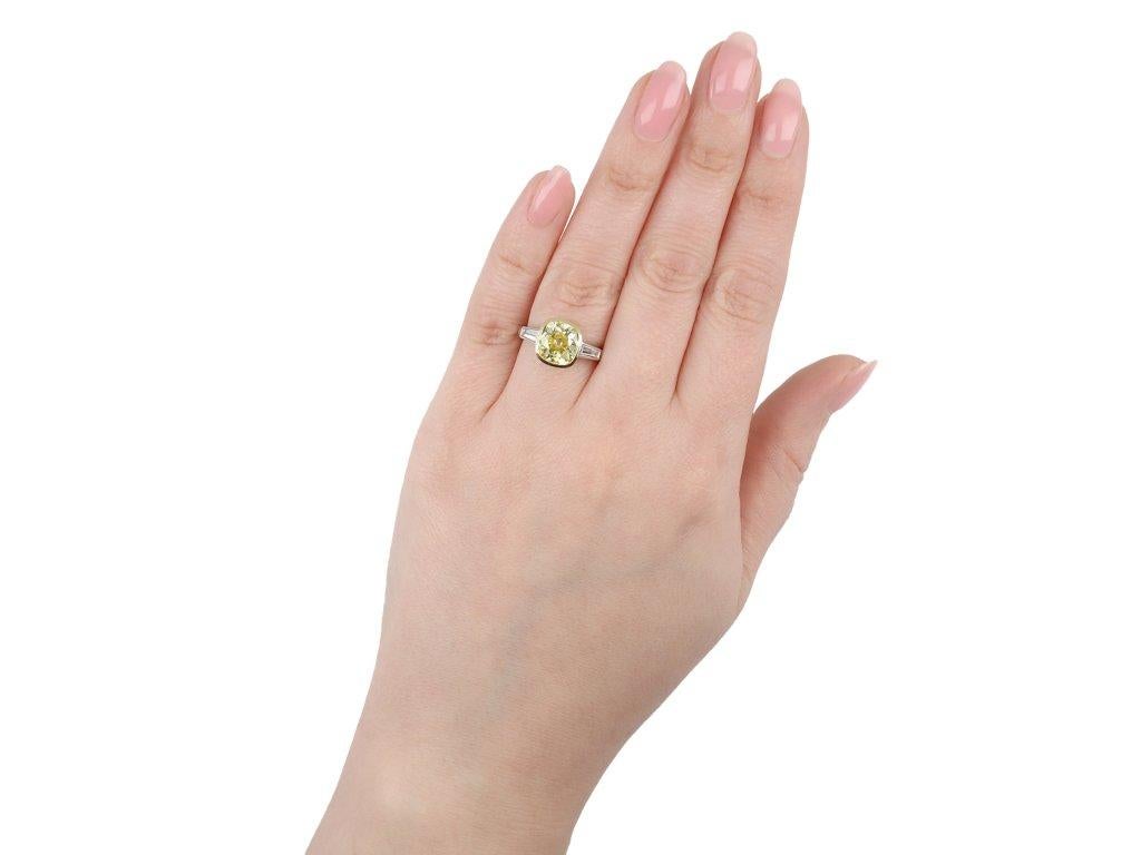 Women's or Men's Fancy Intense 2.39 Carat Yellow Diamond Flanked Solitaire Ring, circa 1950 For Sale