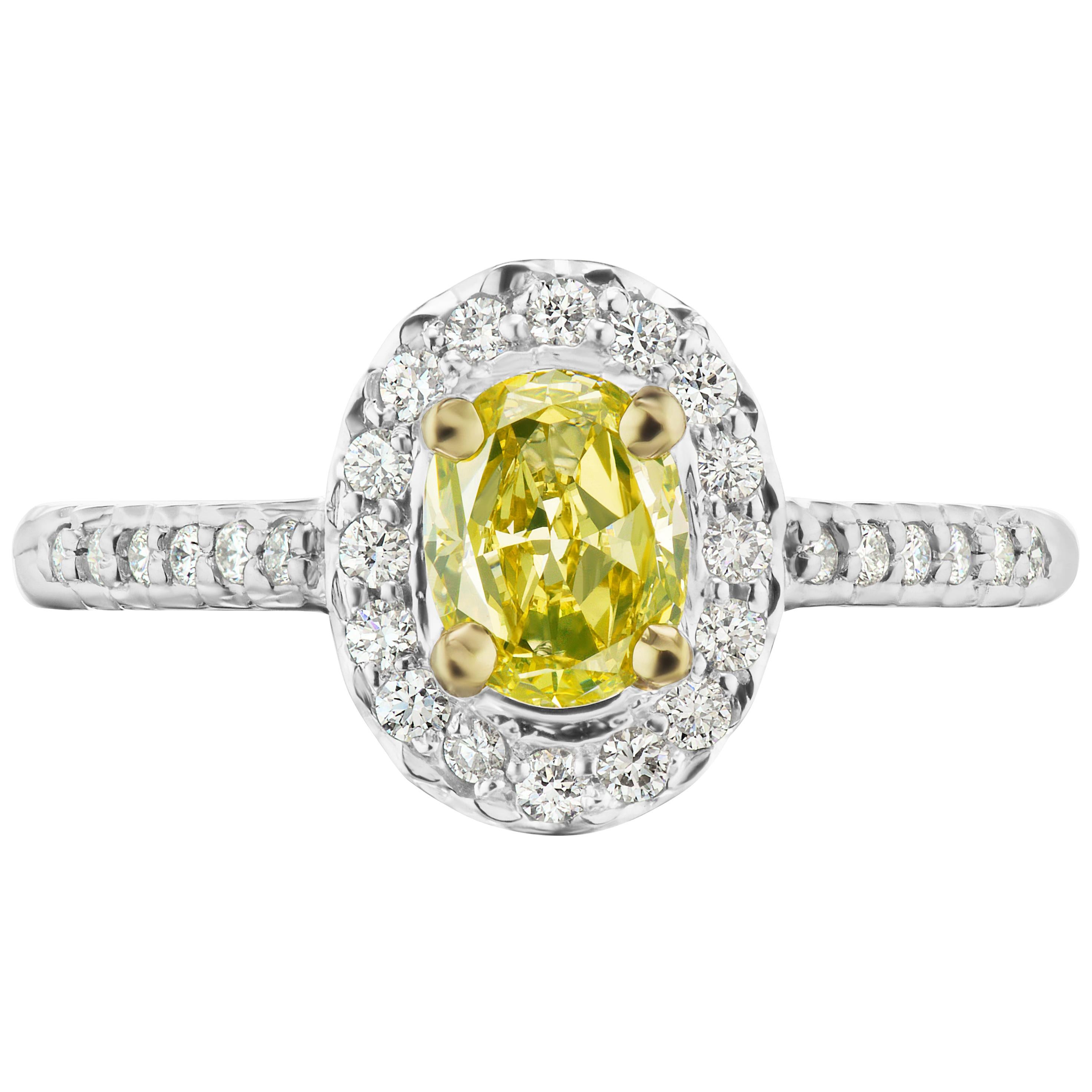 Fancy Intense Greenish-Yellow .77ct. conflict free Oval GIA Cert. Diamond Halo For Sale