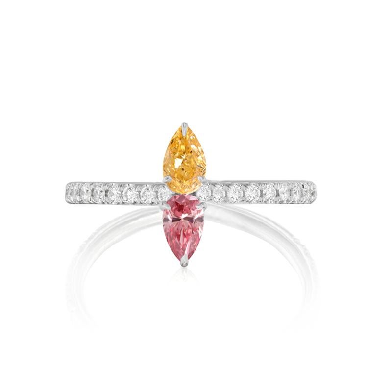 Fancy Intense Pink Natural Diamond 0.36 carat Pear shape, I2 clarity and
Fancy Intense Orange Natural Diamond 0.52 carat Pear shape, Si1 clarity.
According Gia certificate 15830774 and 15830713.
Mounted on Crossover white diamond on white 18K gold
