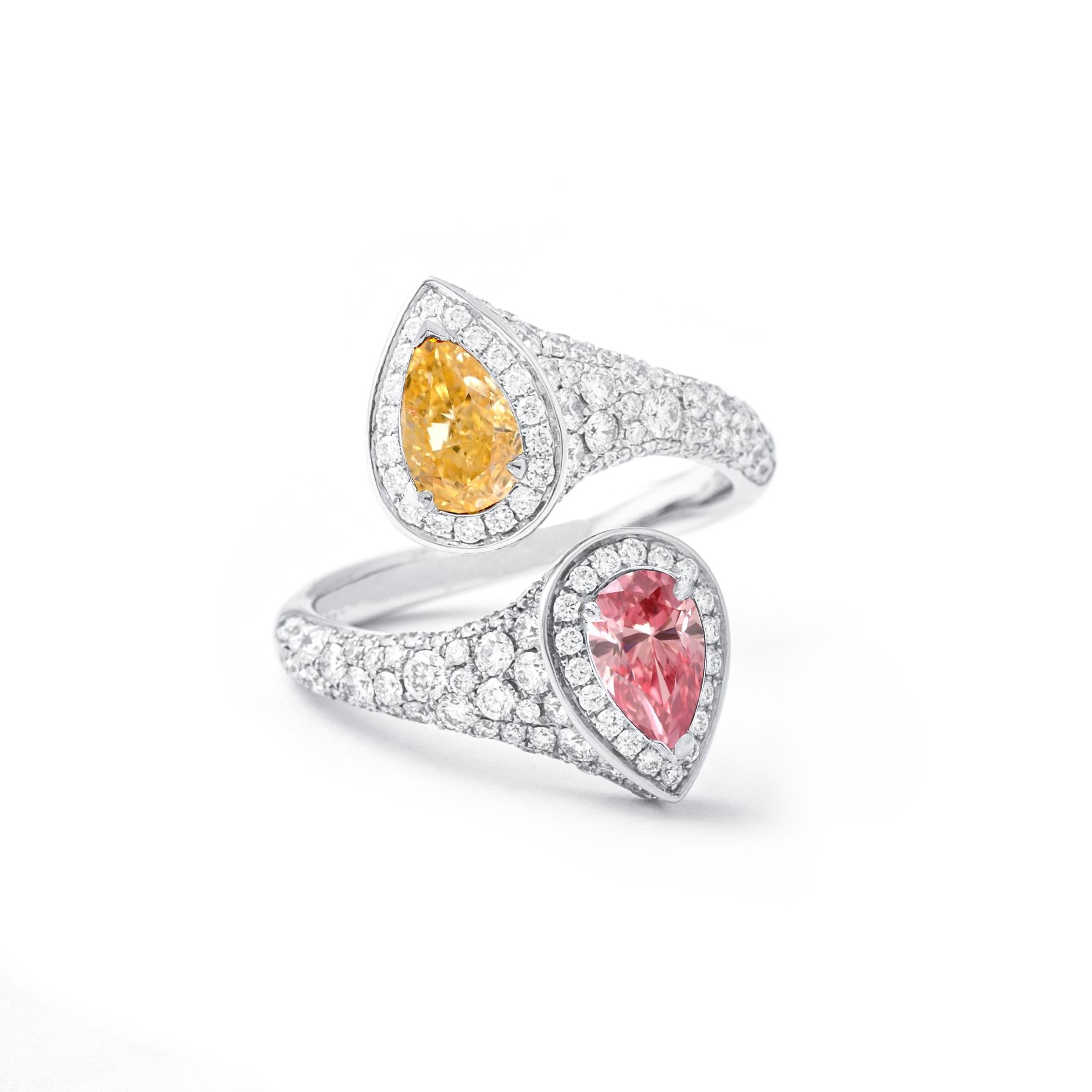 Fancy Intense Pink Natural Diamond 0.36 carat Pear shape, I2 clarity and
Fancy Intense Orange Natural Diamond 0.52 carat Pear shape, Si1 clarity.
According Gia certificate 15830774 and 15830713.
Mounted on Crossover white diamond on white 18K gold