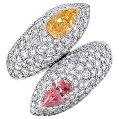 Crossover-Ring aus 18 Karat Gold mit intensiv rosa und orangefarbenen Fancy-Diamanten