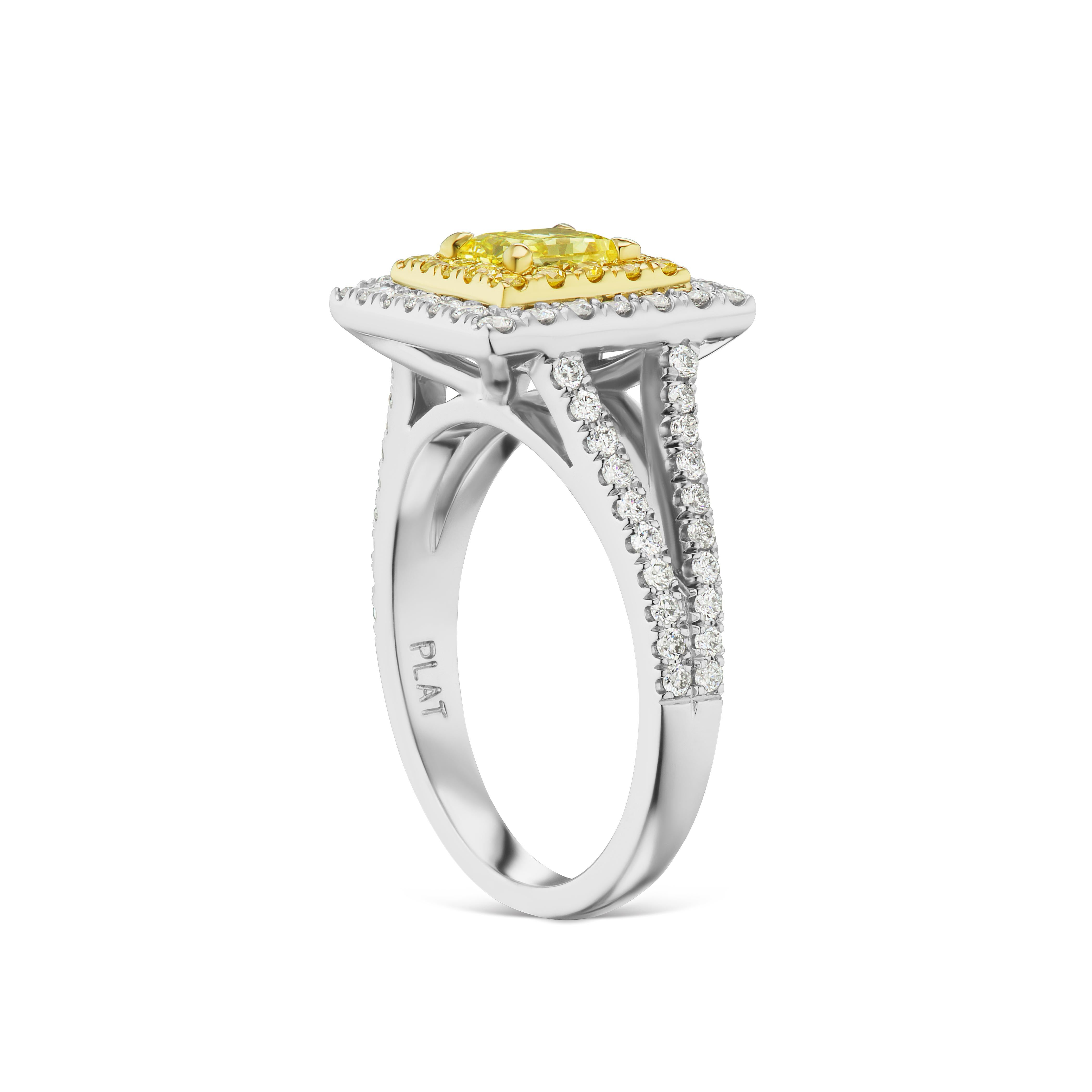 This Fancy Intense Yellow Certified .60 ct. Princess stunner is surrounded by another .17ct. total weight of fancy intense melee. It's a micro blast of sunshine! The Platinum and 18kt ring also contains .53 ct. total weight of FVS white diamond
