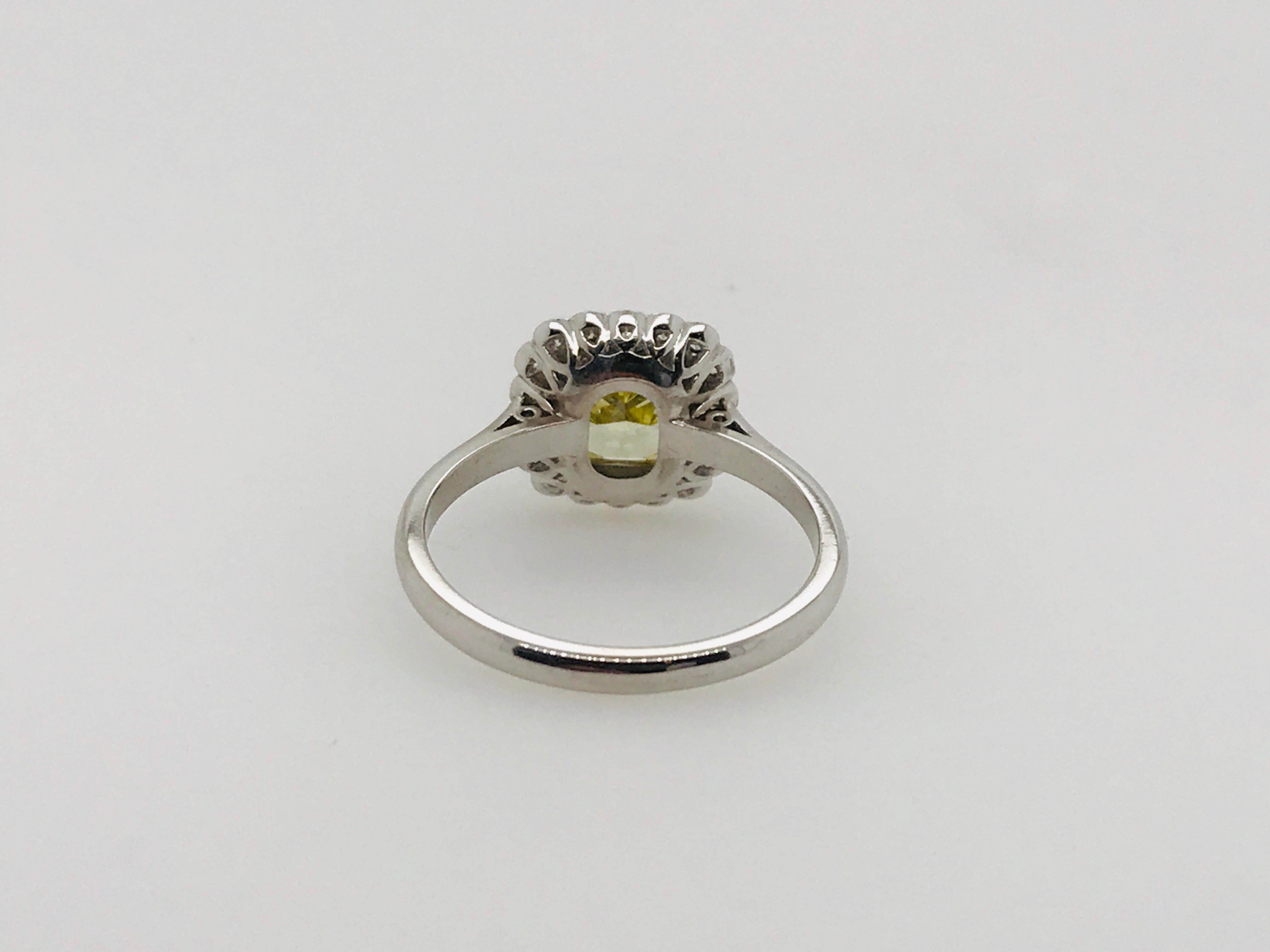 Handmade scalloped cluster ring in 18ct white gold 
centre diamond 2.18ct FIY VS1
18 brilliant cut diamonds totalling 0.25ct GVS
finger size M - can be resized